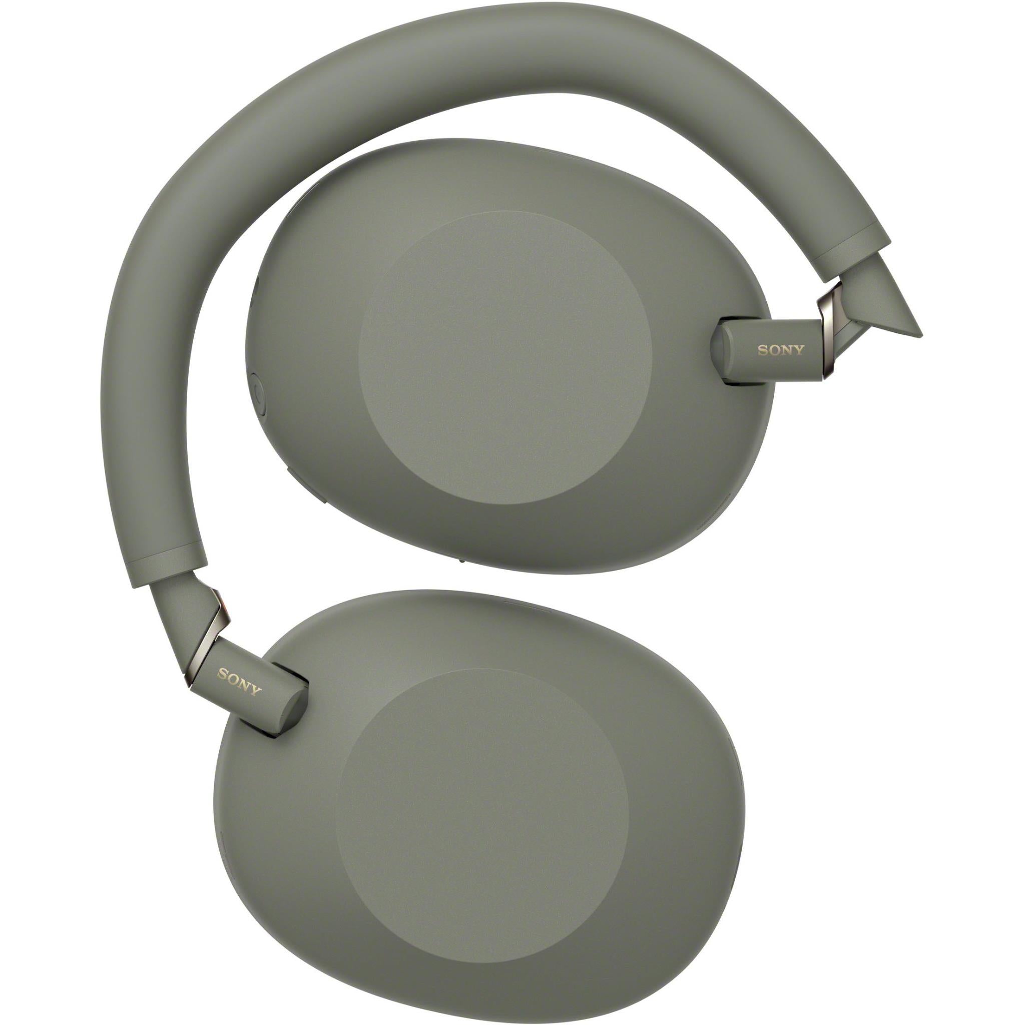 Olive grey over-ear headphones folded for storage with ear cups facing upward.