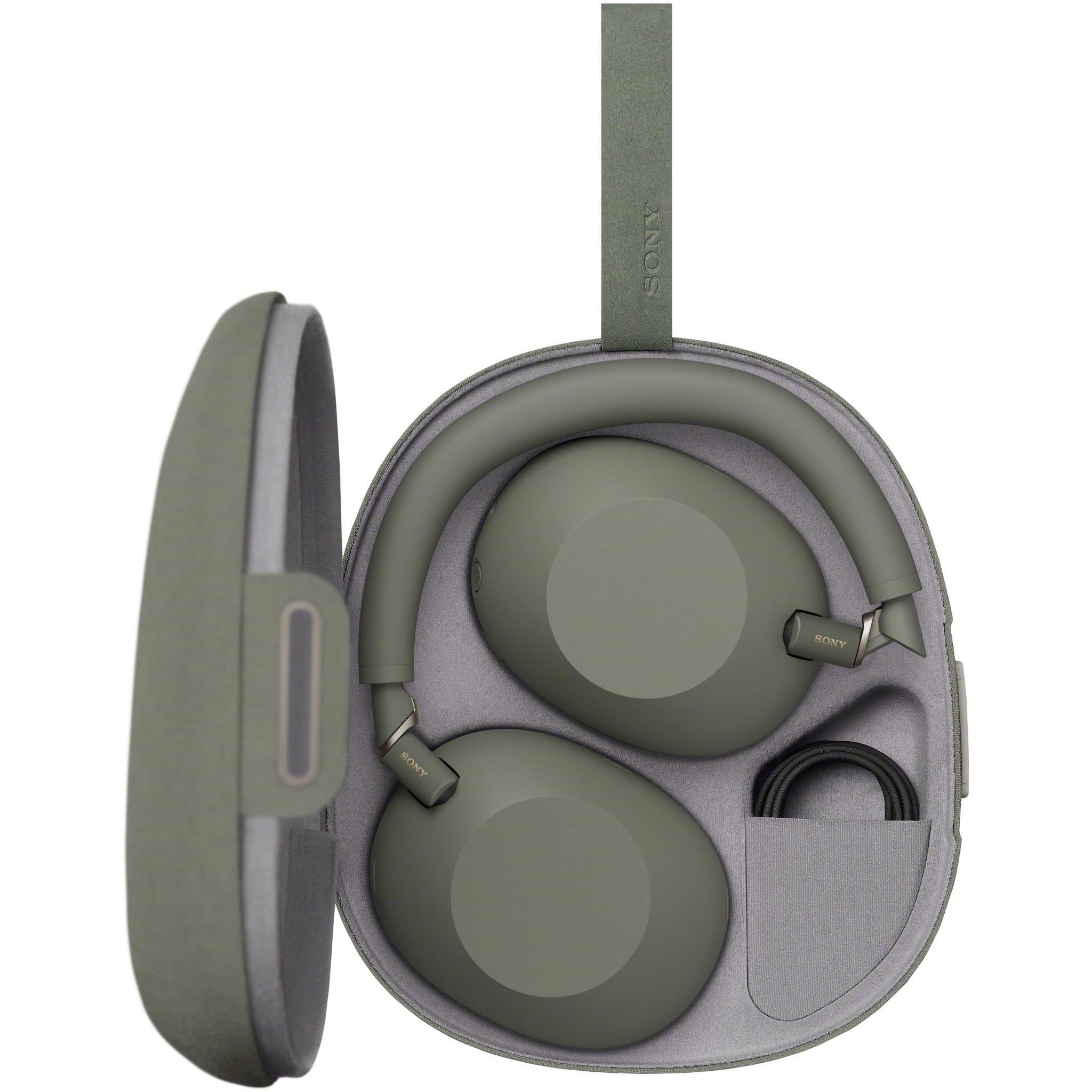 Olive grey over-ear headphones with open ear cup showing cushioned inner padding.