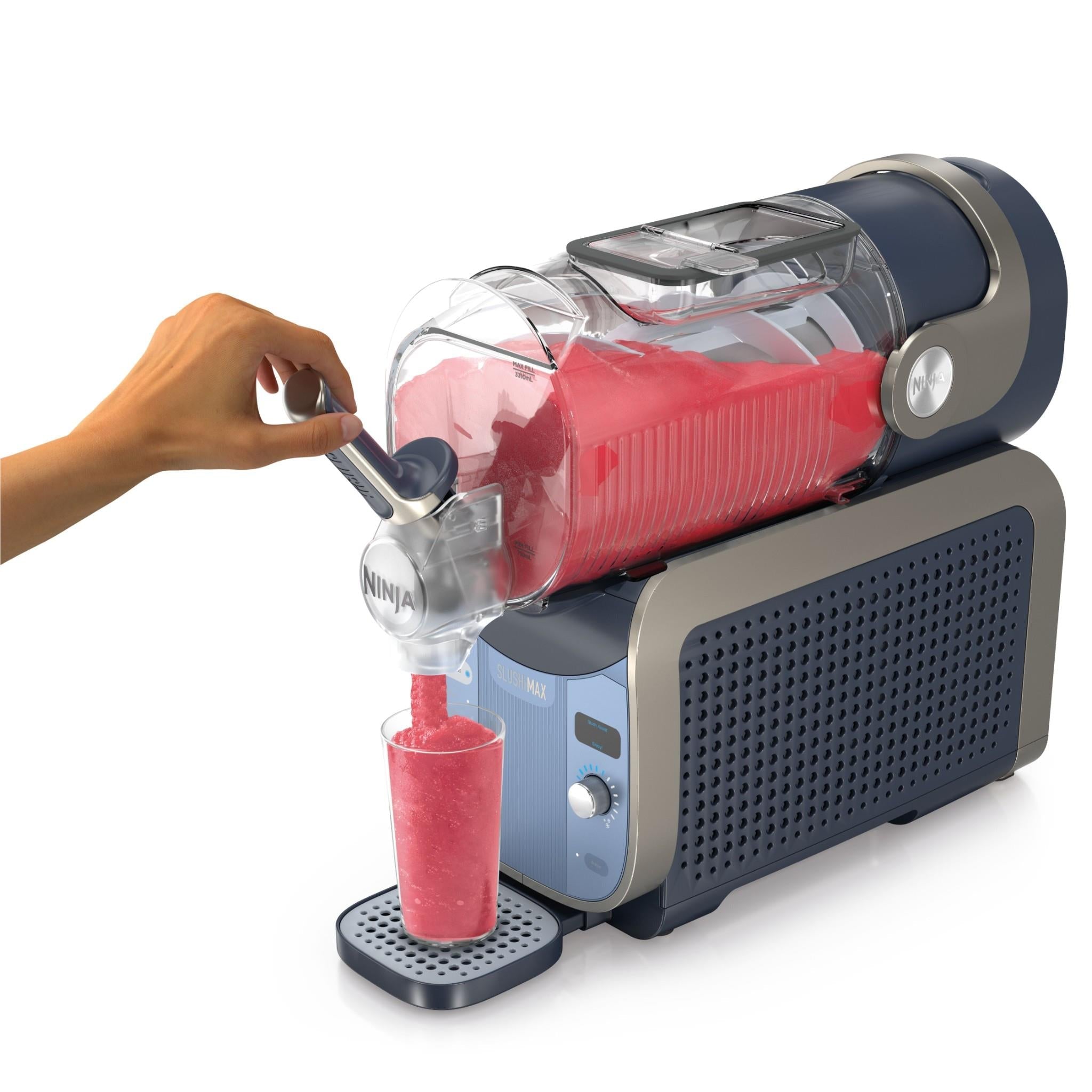 Blue frozen drink maker with red frozen drink filling a glass by hand