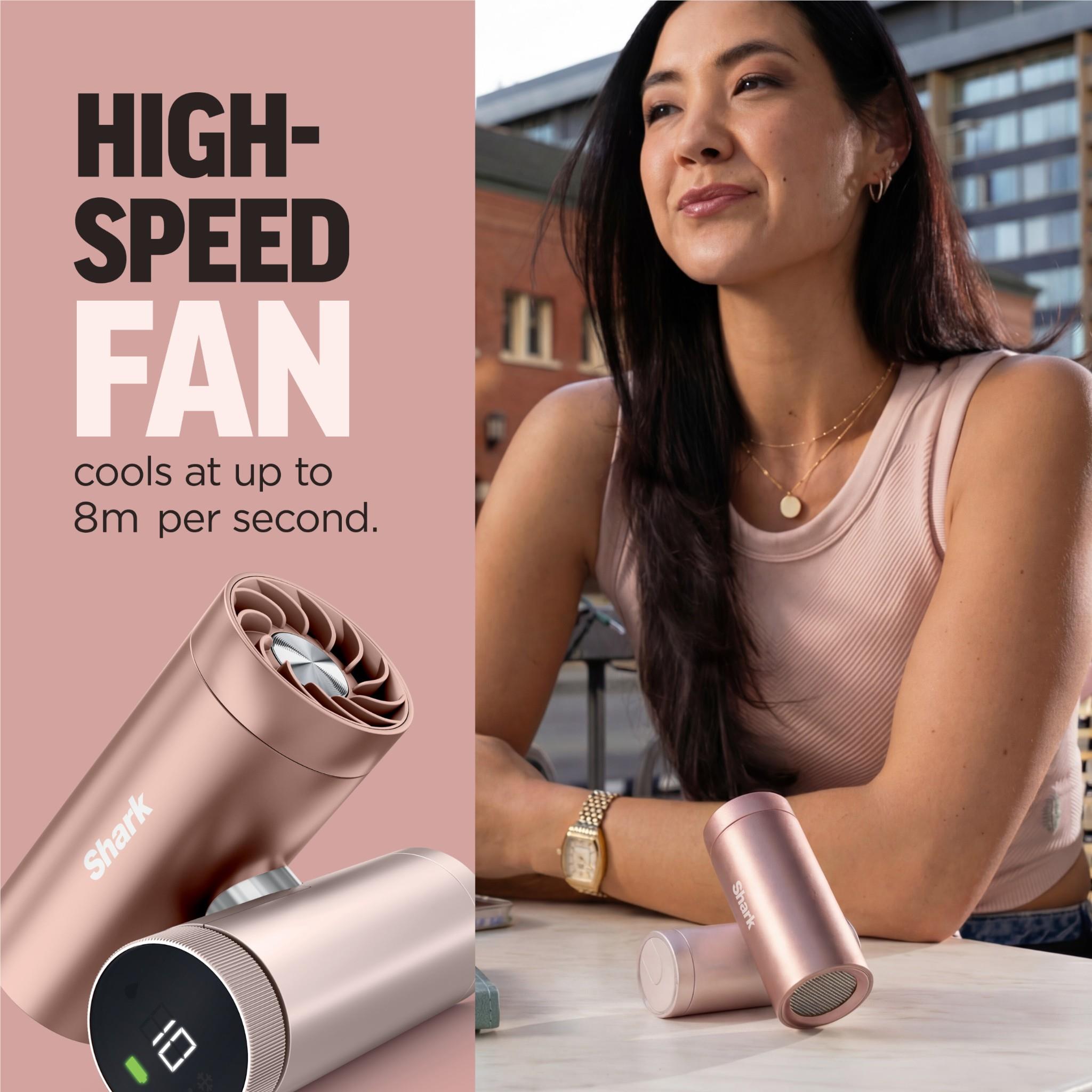 Rose gold handheld fan and mister with open fan head and digital display