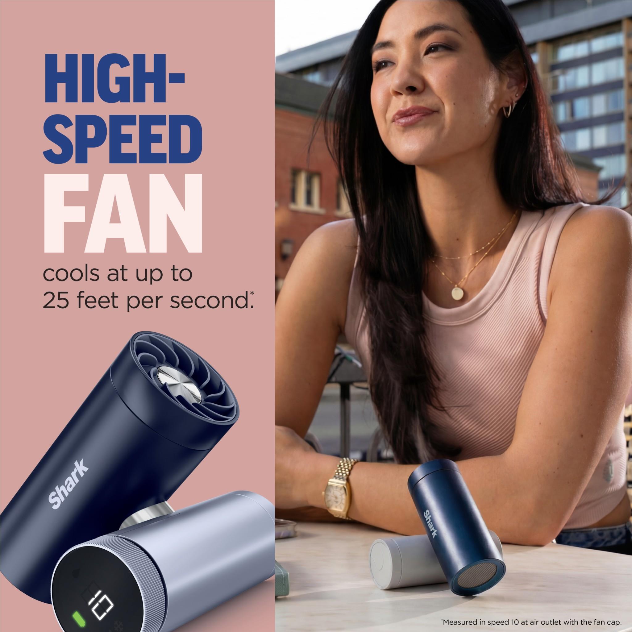 Navy handheld fan and mister with circular display, plus matching silver canister.