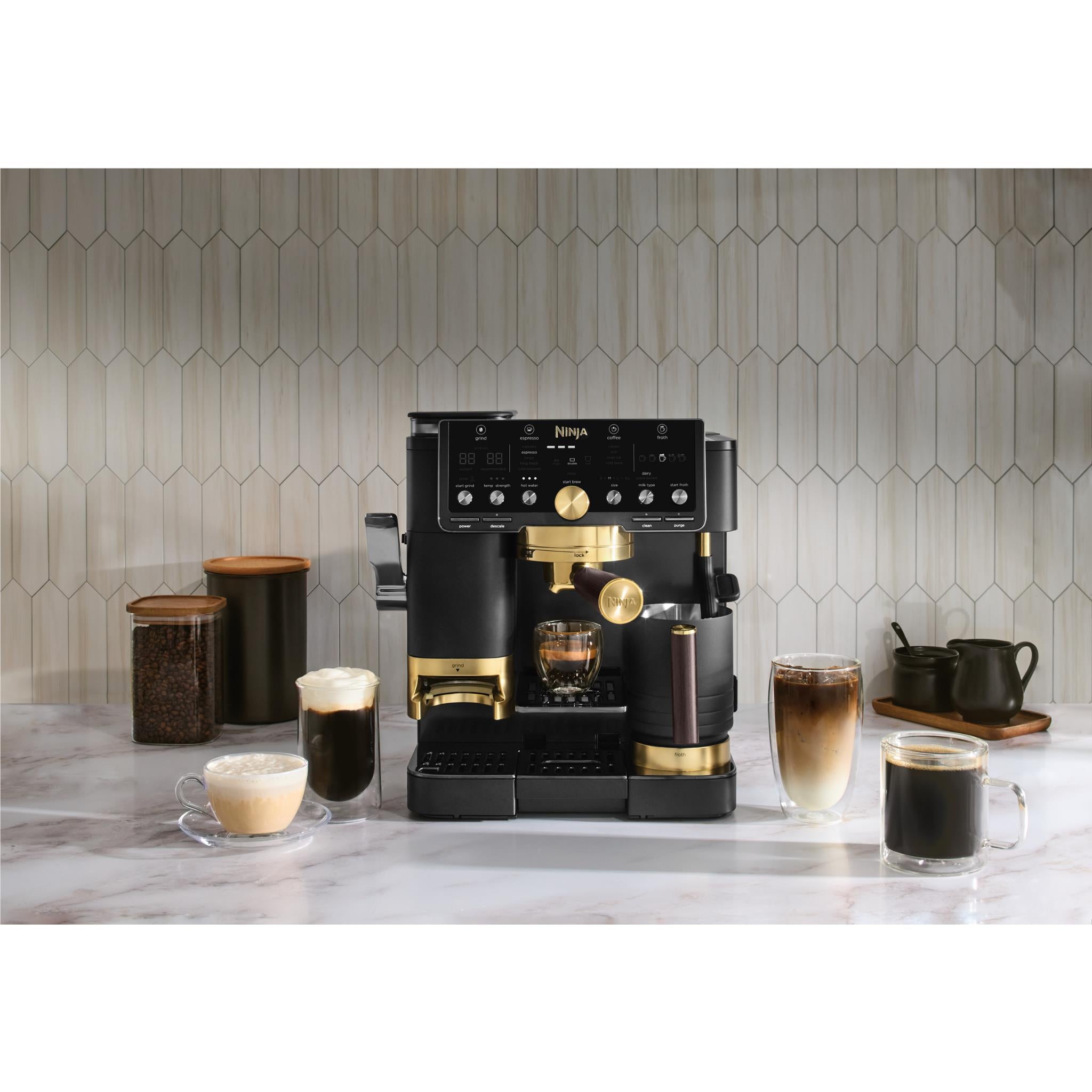 Ninja 3-in-1 espresso system in black with gold accents and drip tray