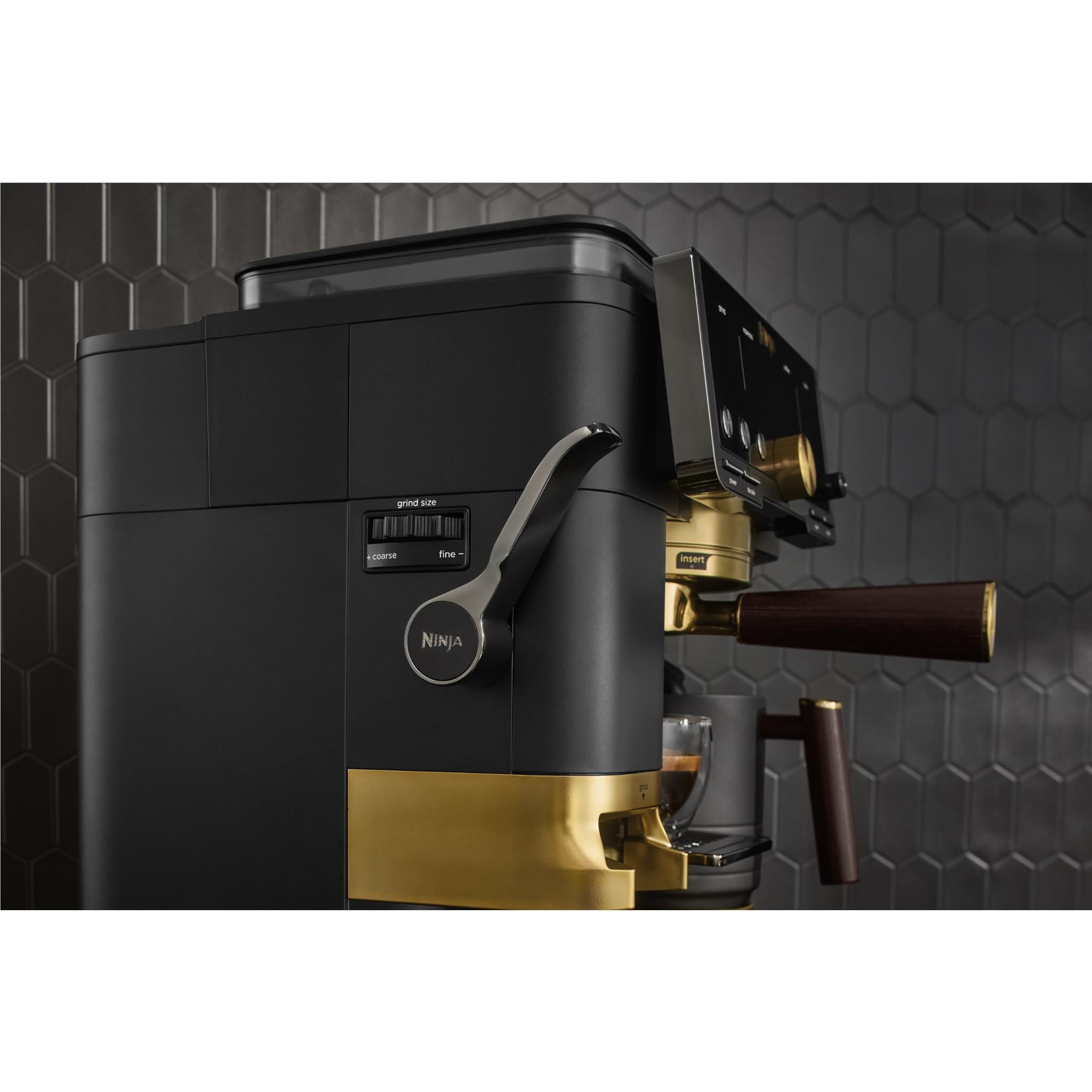 Side view of black Ninja espresso machine with gold base and dark wood handle