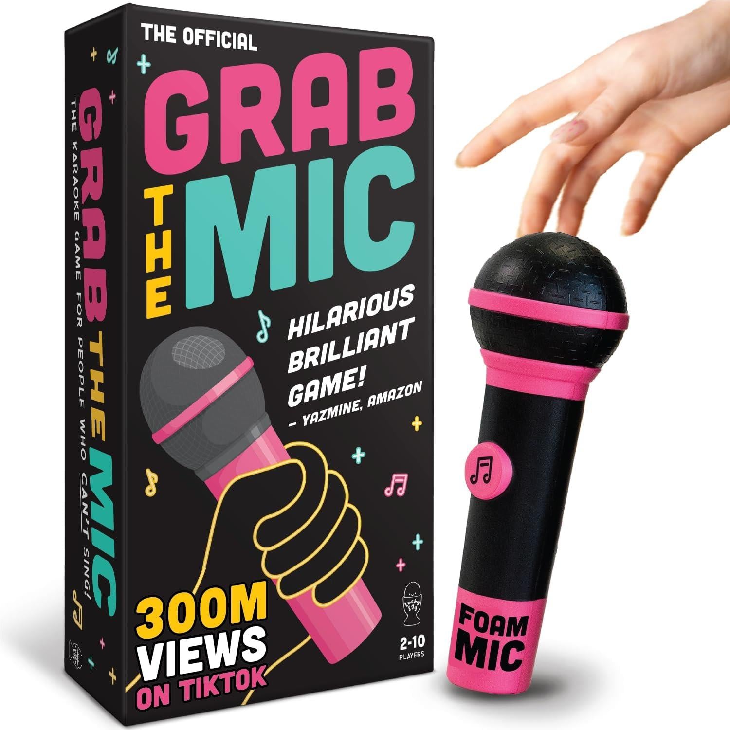 Karaoke party game box with pink foam microphone prop