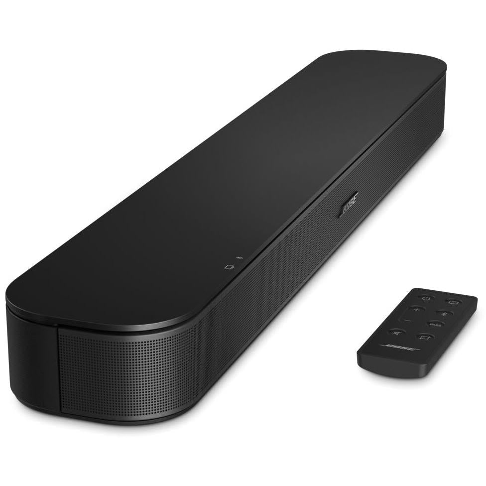 Black Bose TV soundbar with included remote control, showing front grille.