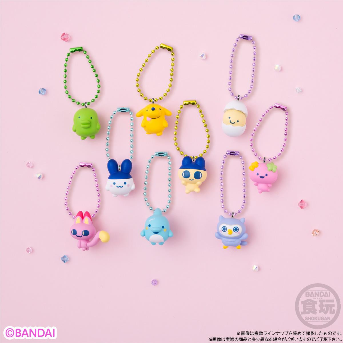 Assorted character mini keychains, beaded loops with small pastel pendants.