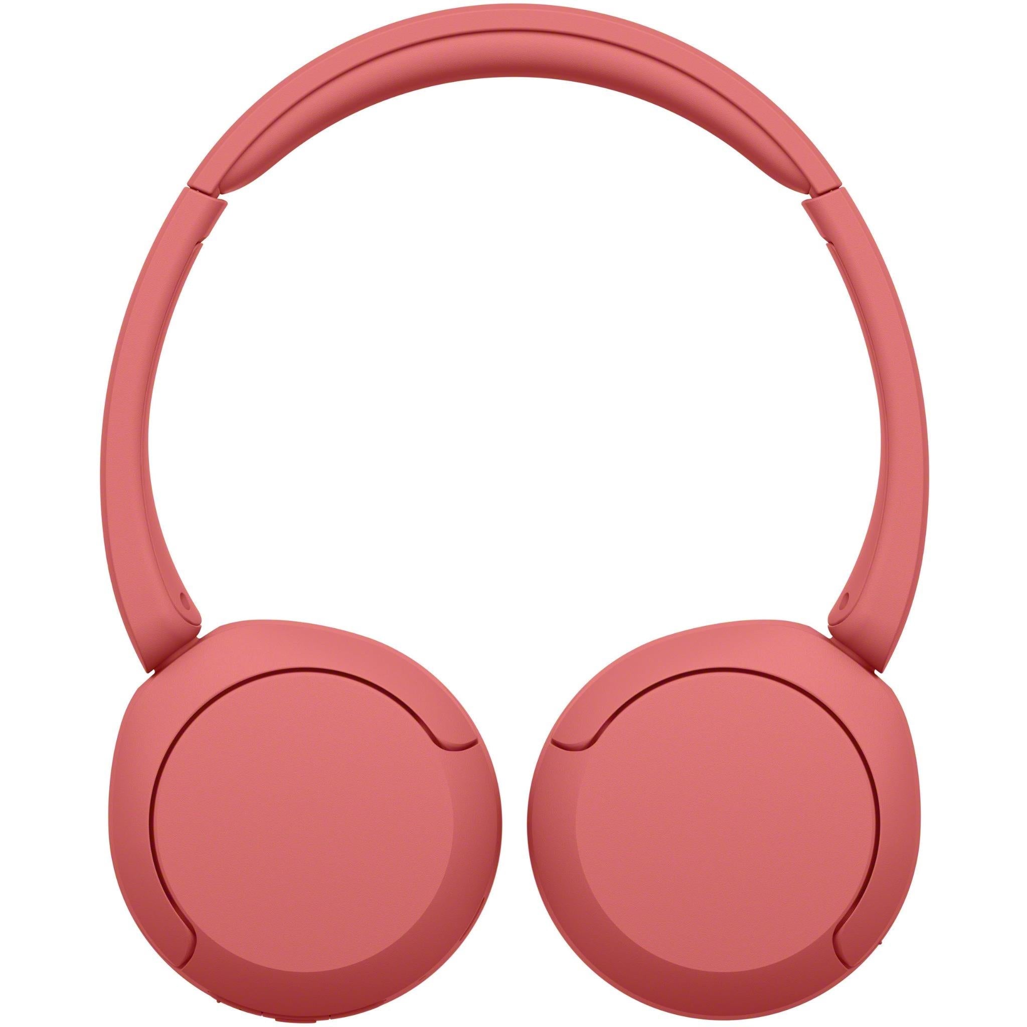 Coral red on-ear wireless headset, front view of padded ear cups