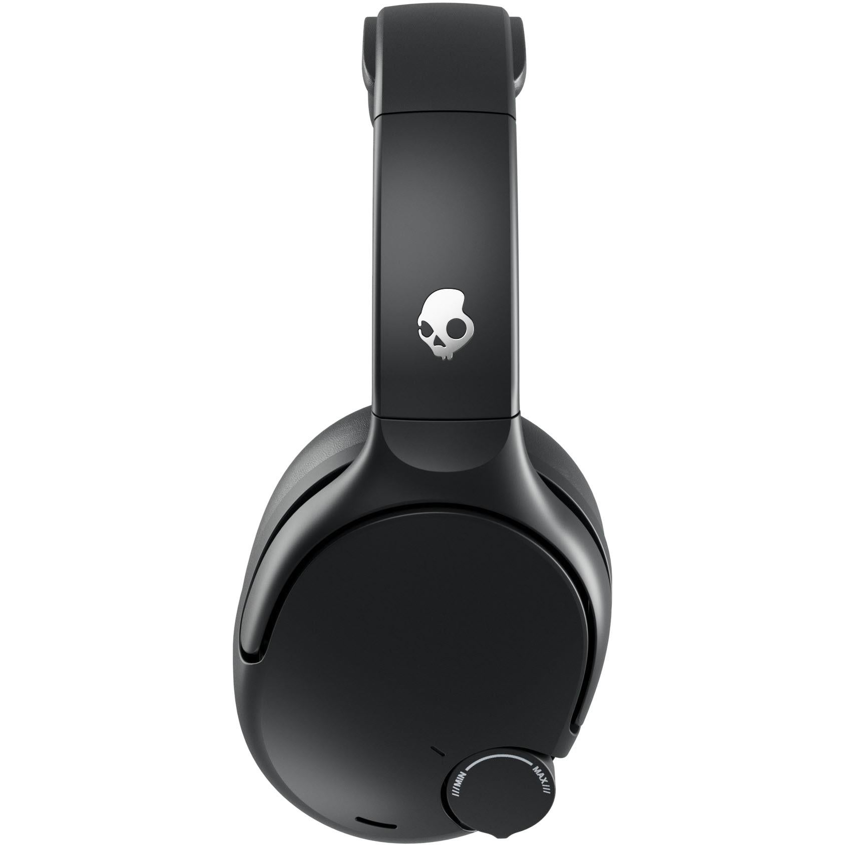 Black over-ear Bluetooth headphones with skull emblem on the headband