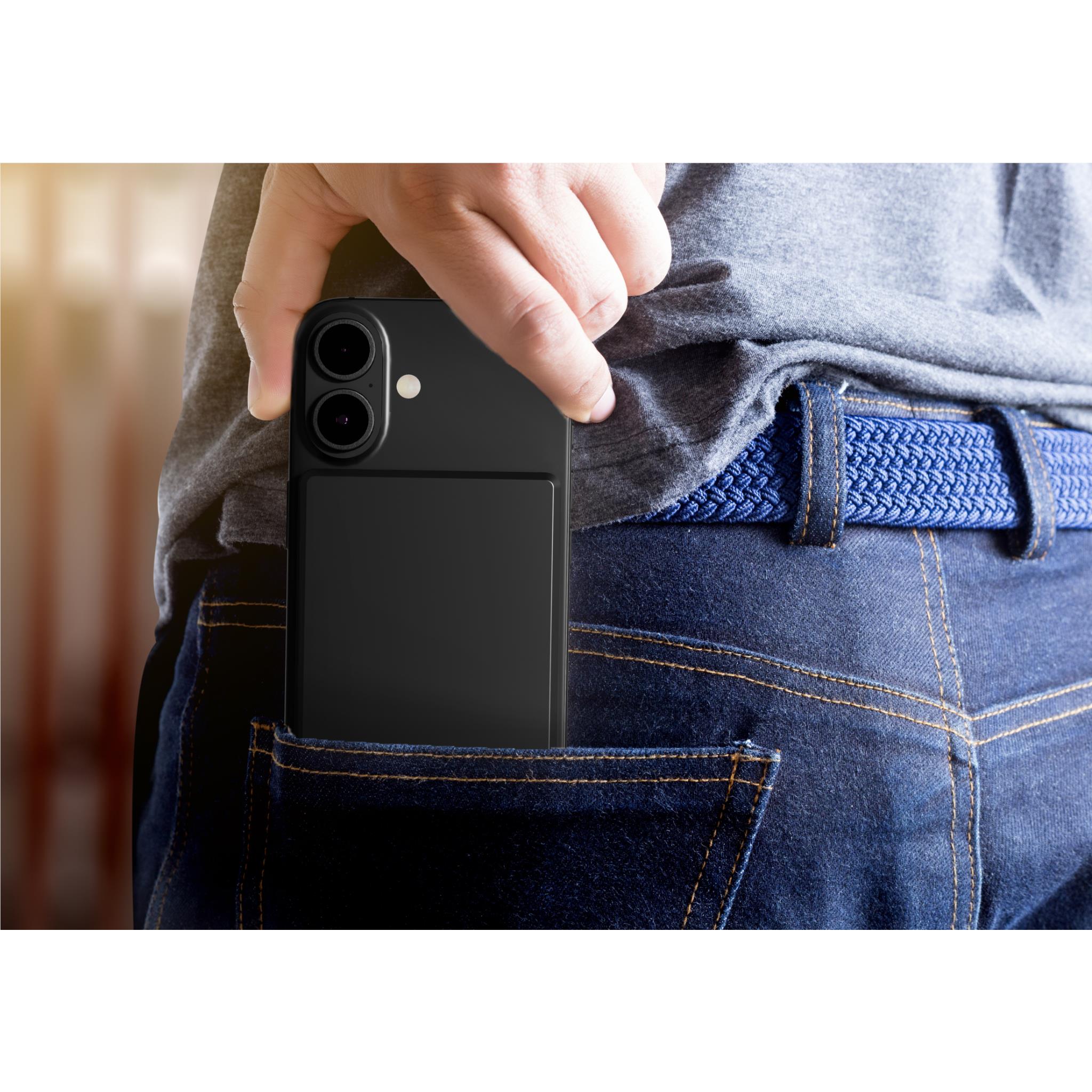 Cygnett magnetic wireless power bank near a smartphone, slim black rectangle