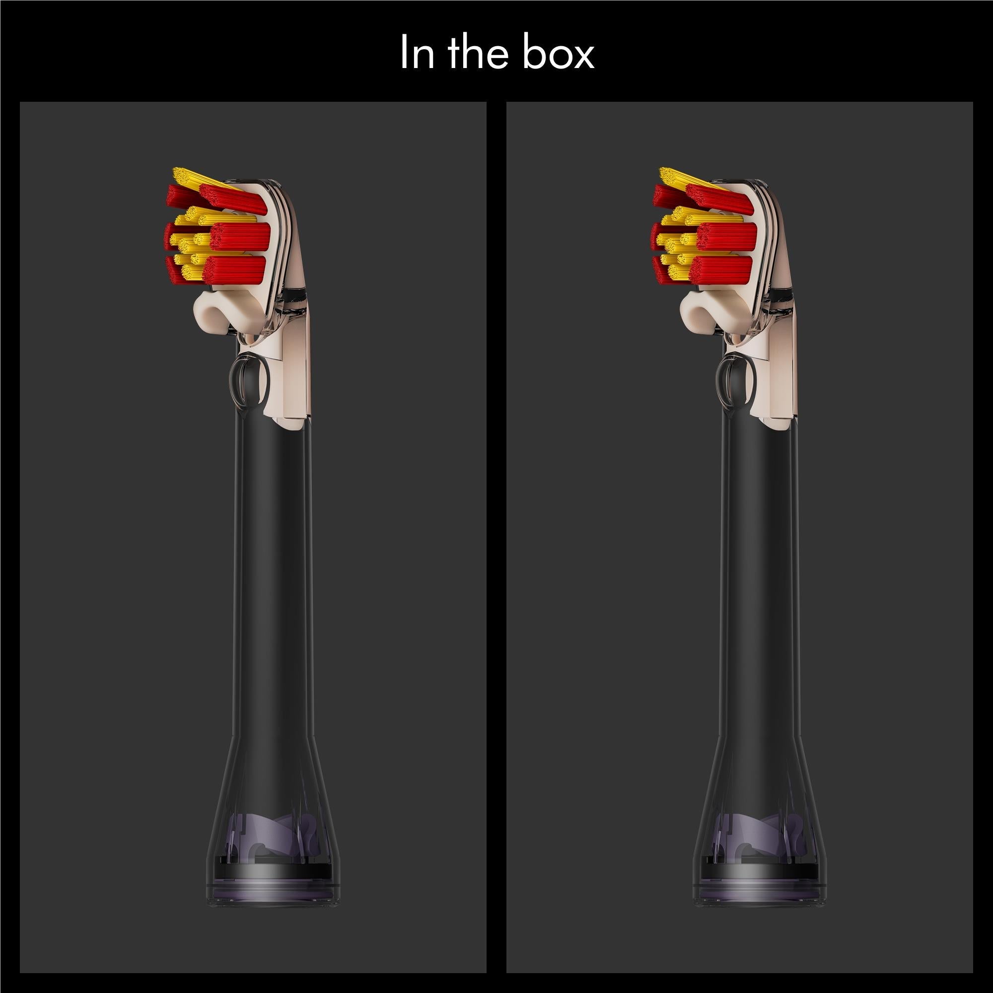 Two Dyson CameraJet dual-bristle brush heads shown in box, red and yellow bristles