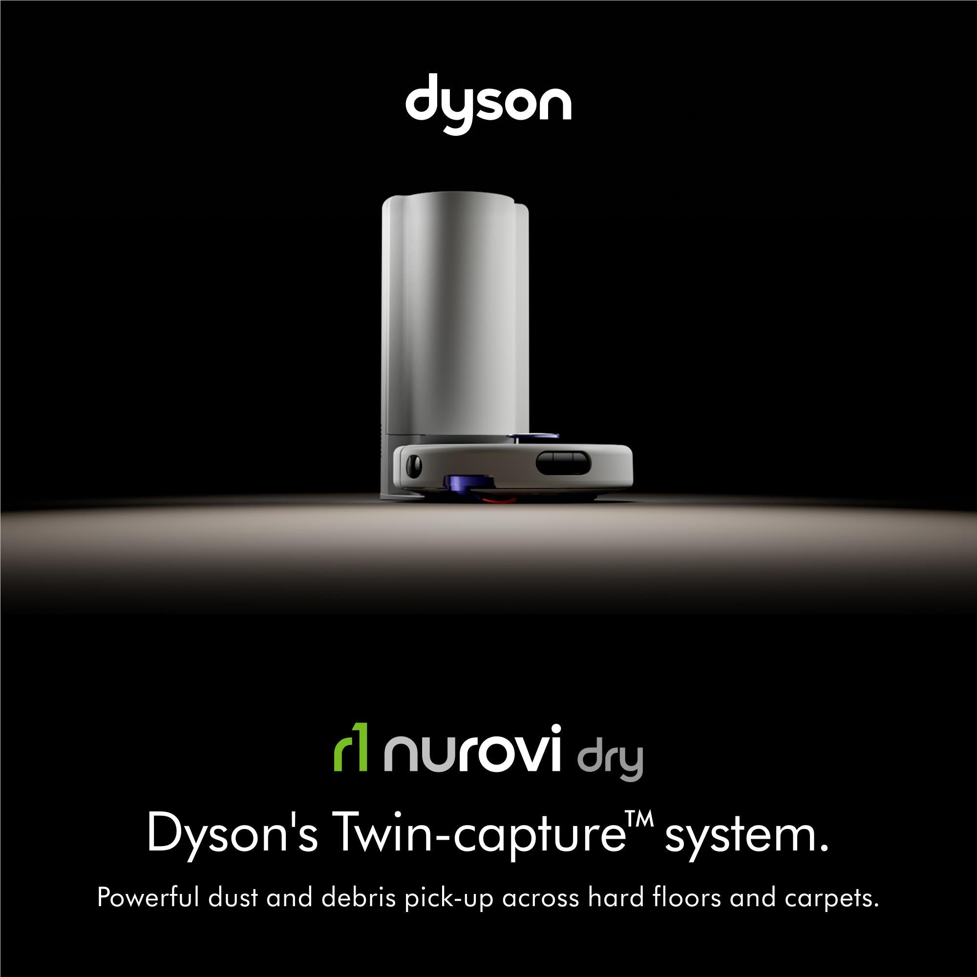 Dyson robot vacuum dock with upright white canister and purple base accents