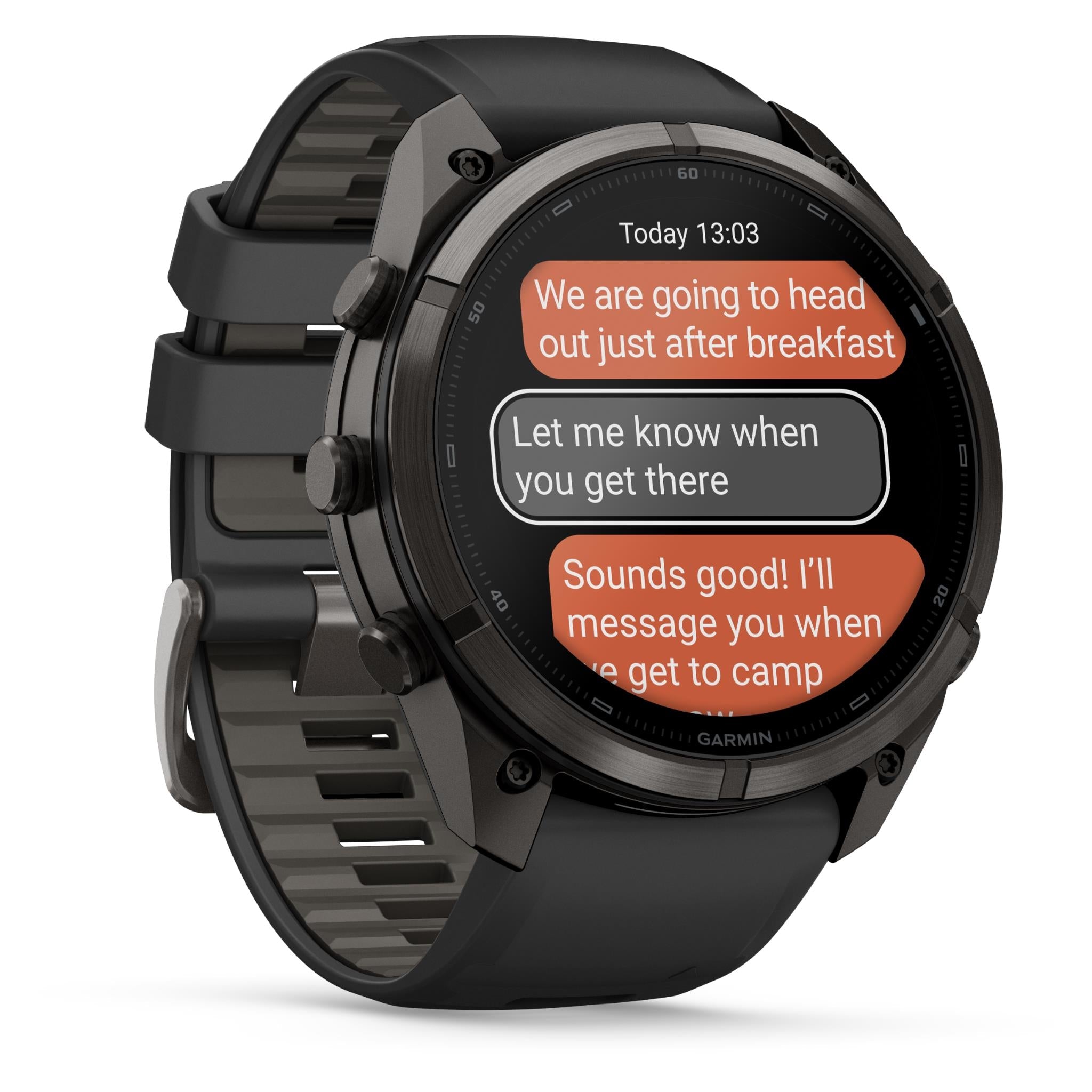 Garmin GPS watch with black silicone strap, angled view showing message notification on screen
