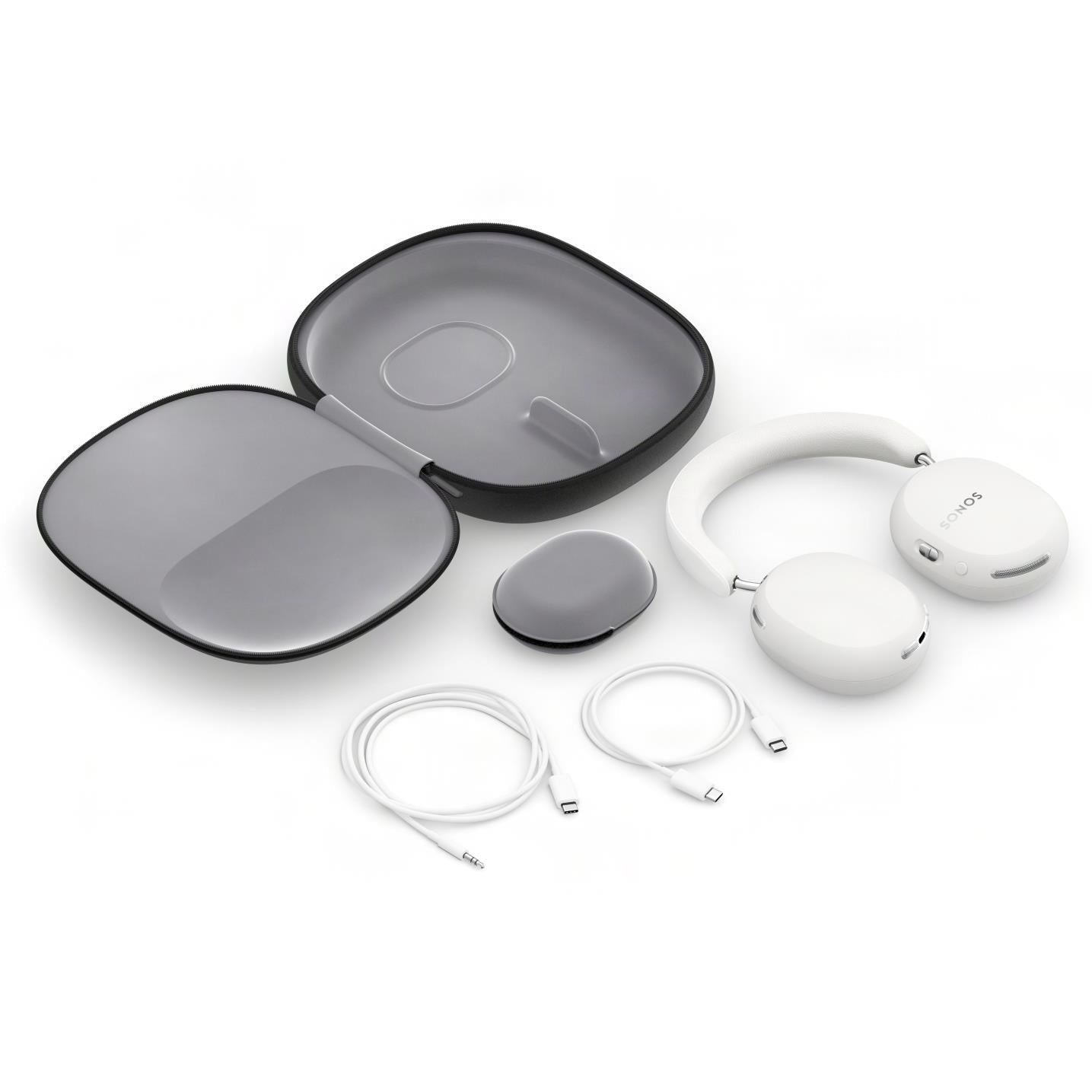 White wireless headphones with accessory case, earbuds, and connecting cables