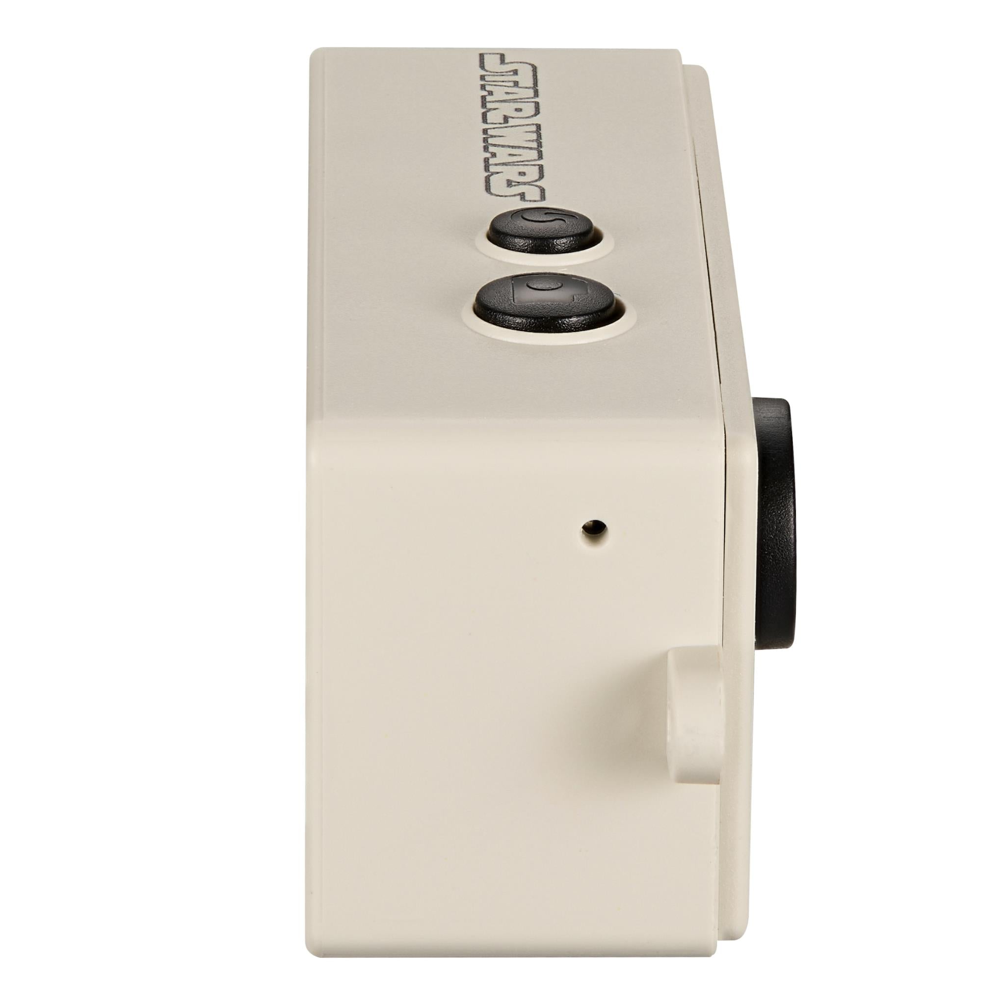 Beige keyring camera side/back view with top buttons and black side control