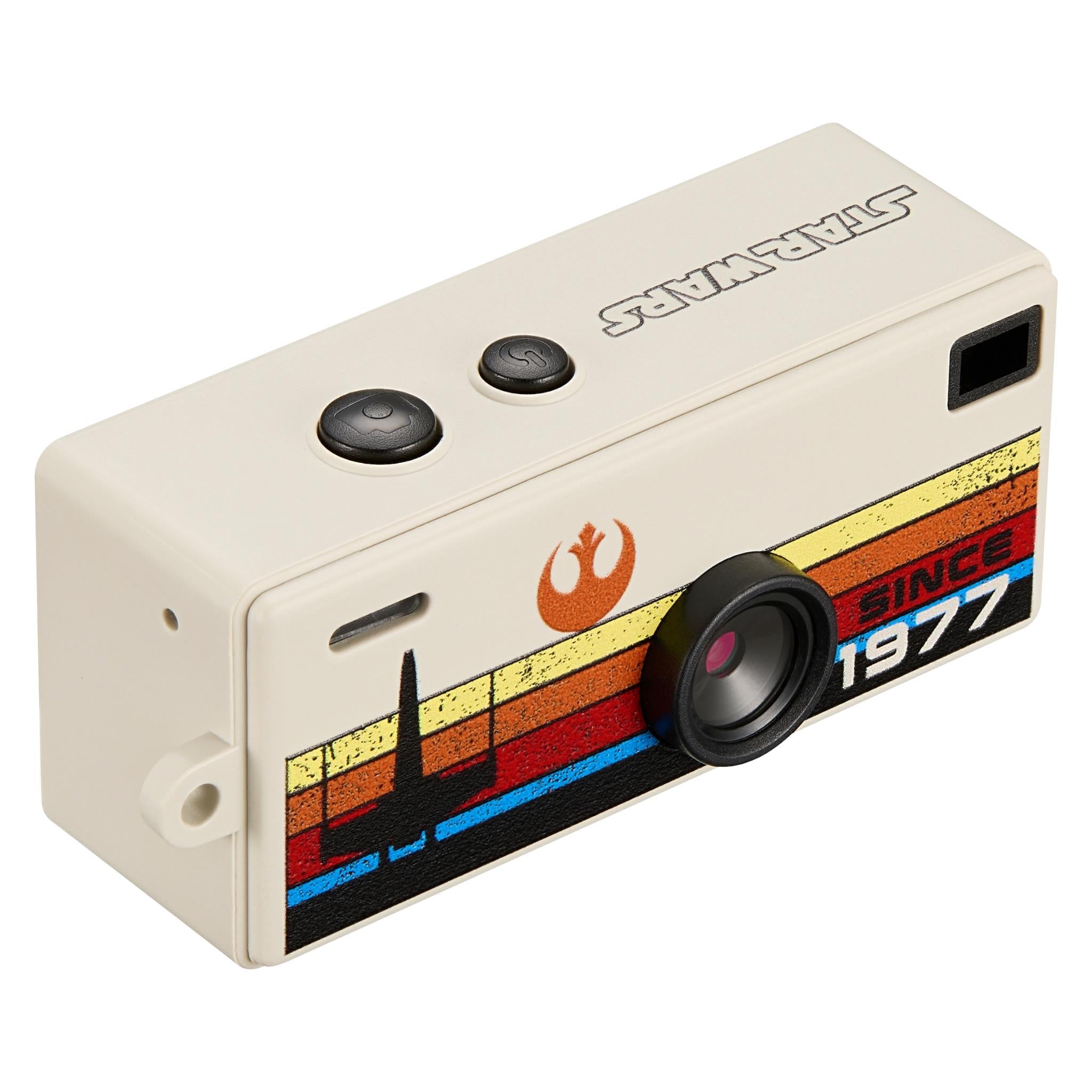 Beige keyring camera angled view with two top buttons and retro graphic stripe