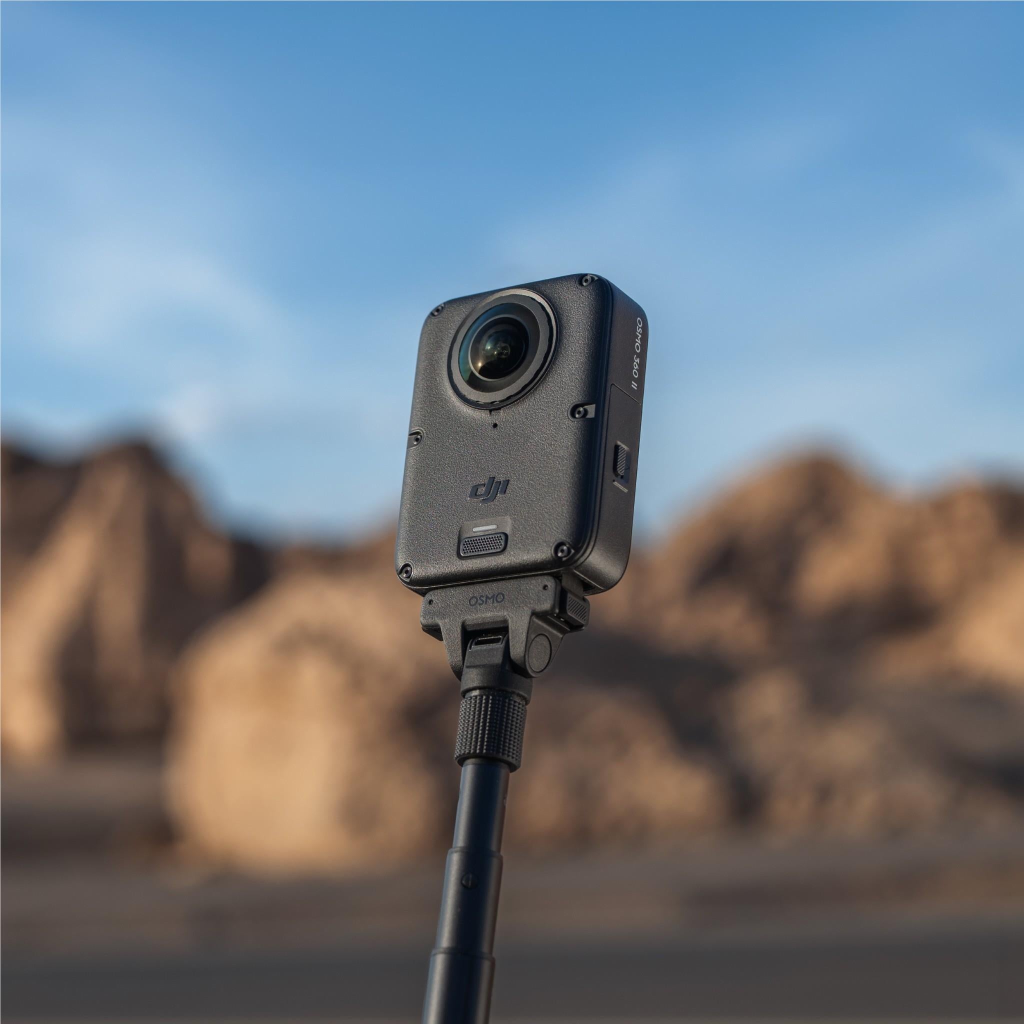 Dark 360 action camera on a handlebar pole mount, lens facing forward