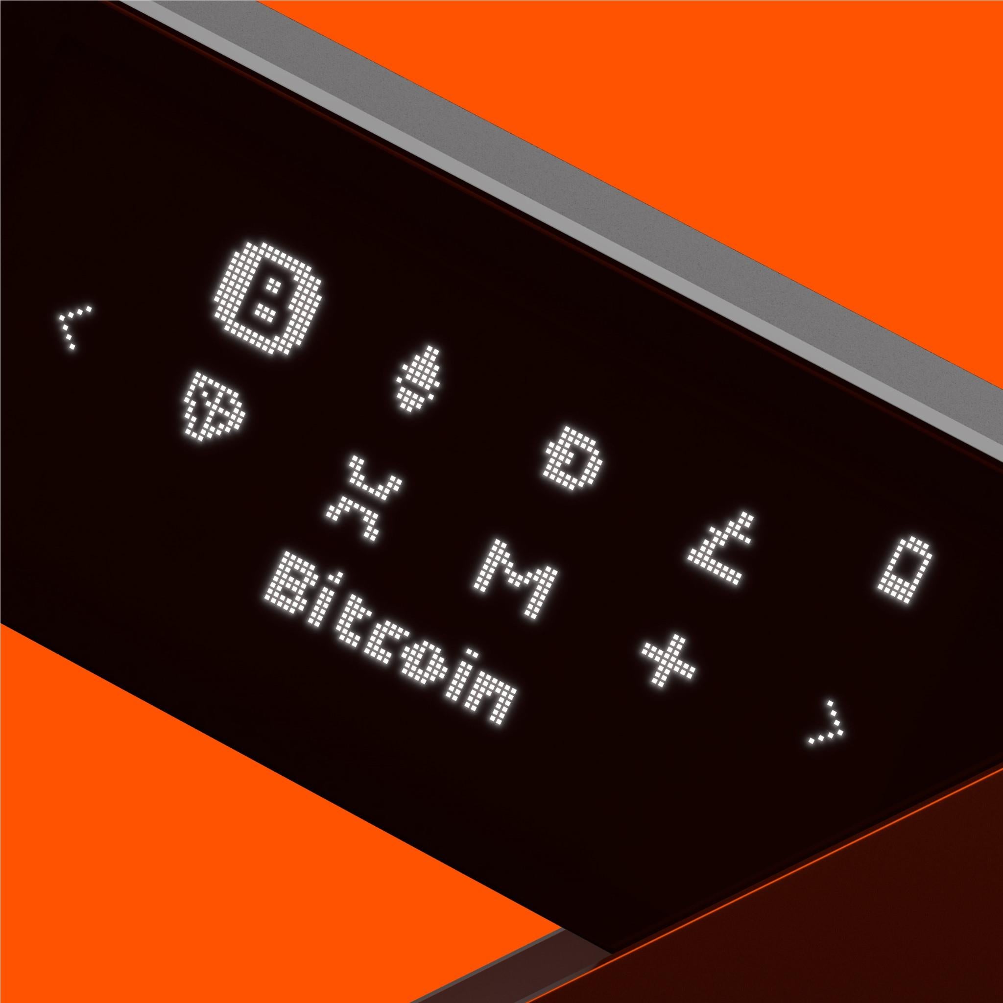 Crypto hardware wallet screen close-up showing Bitcoin symbols and menu icons