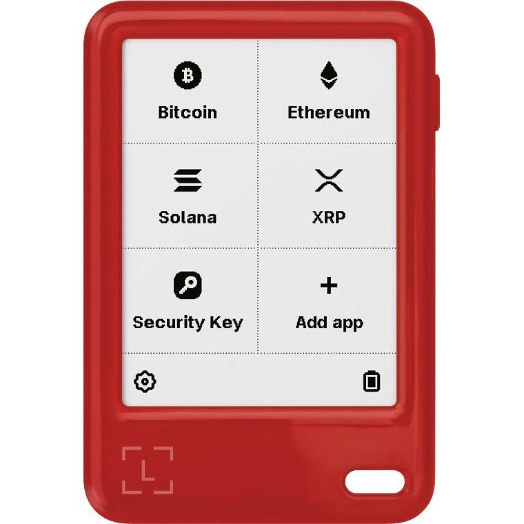Cherry red Ledger hardware wallet with app icons on the screen