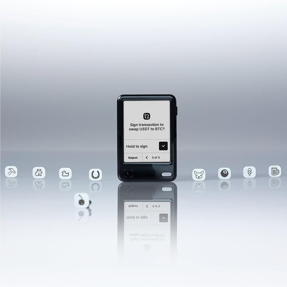 Black-screen Ledger hardware wallet displaying swap and sign options