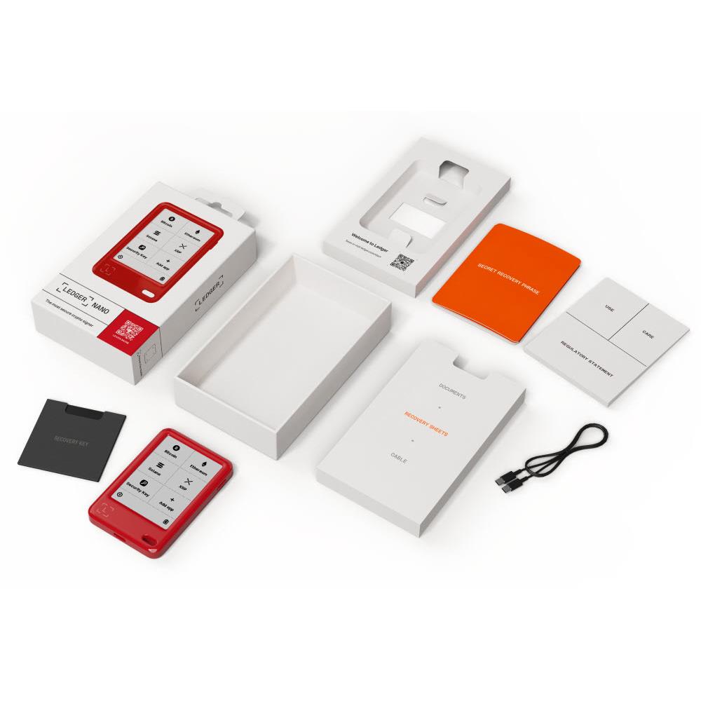 Ledger hardware wallet kit layout with cherry red device and included accessories