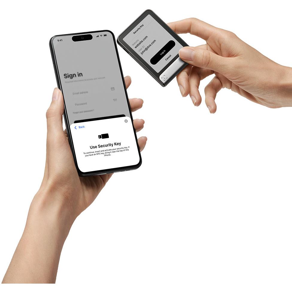 Hands pairing Ledger Flex wallet with mobile app sign-in, security key prompt