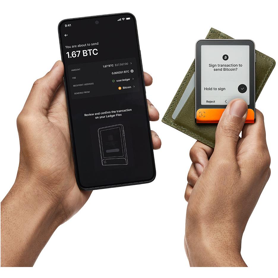 Ledger Flex wallet held alongside phone showing transaction approval screen