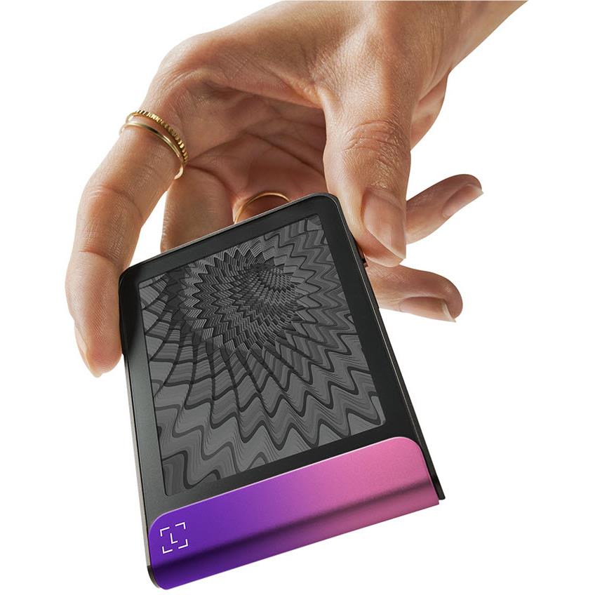 Hardware wallet front with textured pattern, dark face and magenta base edge