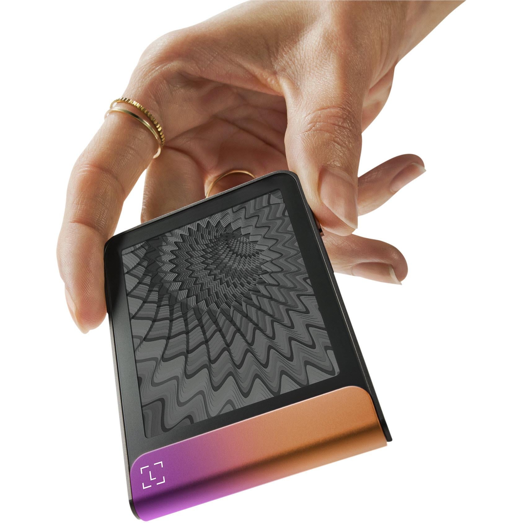 Ledger Flex cold storage wallet with textured pattern panel and purple-orange base