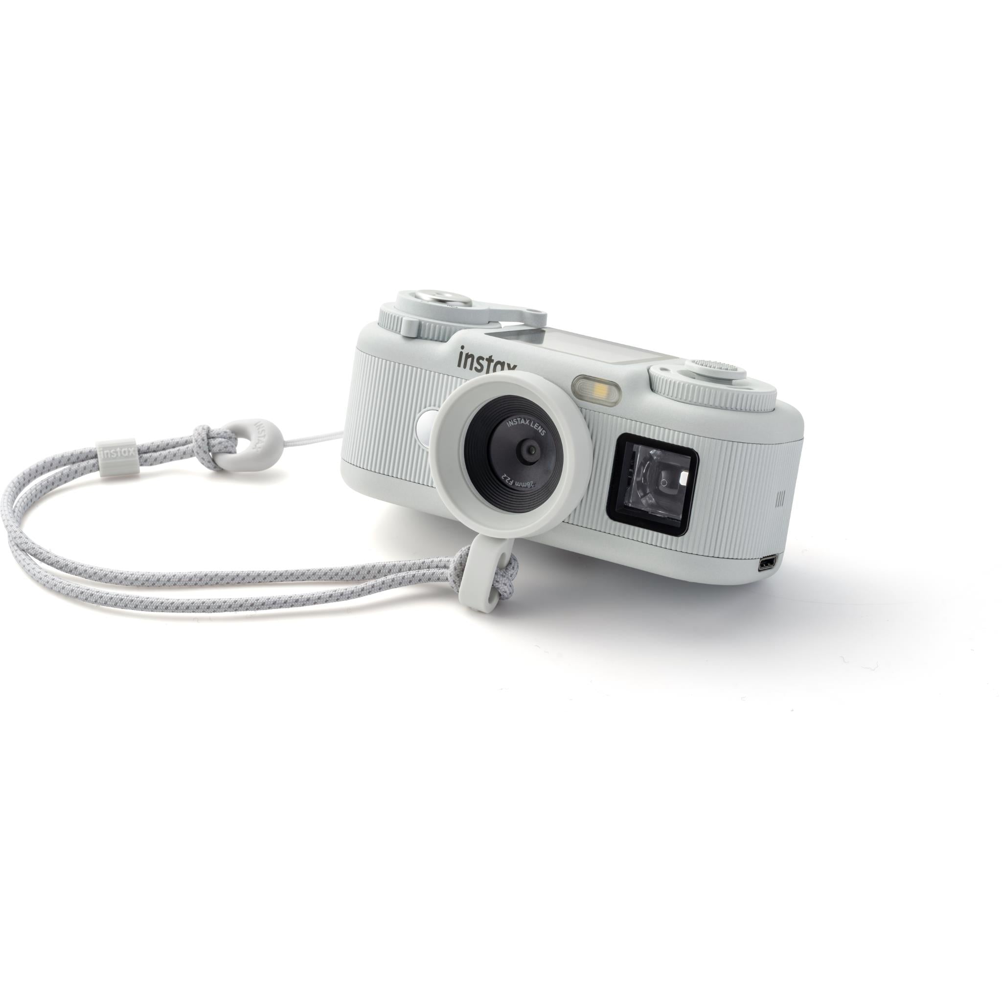 White instax pocket instant camera with wrist strap and front lens