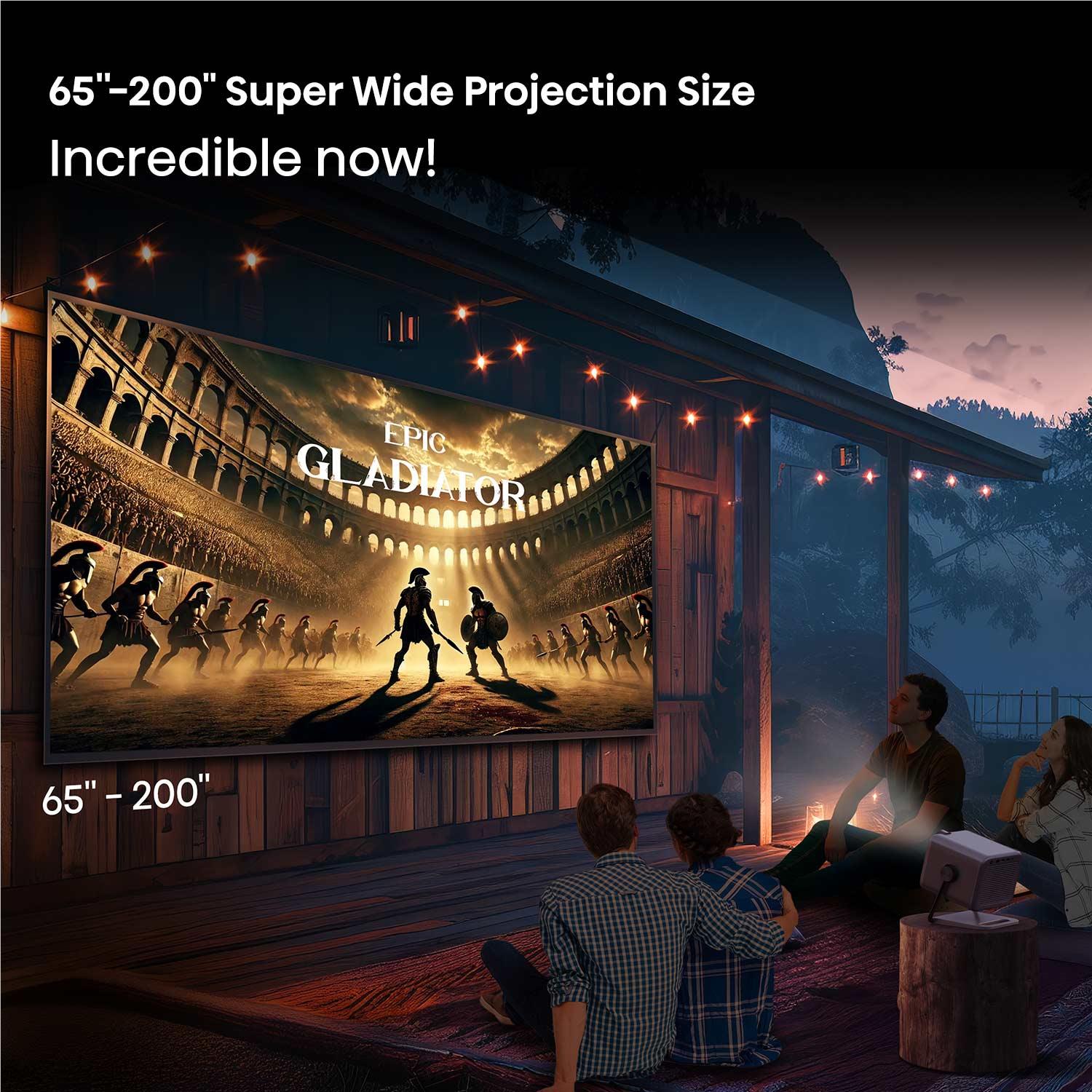 Mini projector on tabletop projecting a movie scene onto a large wall screen