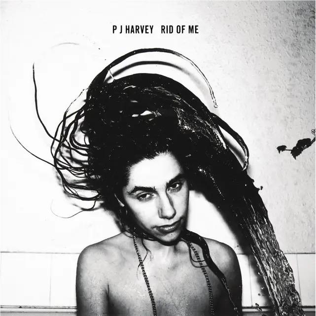 Black-and-white album cover featuring a portrait of a woman with long dark hair
