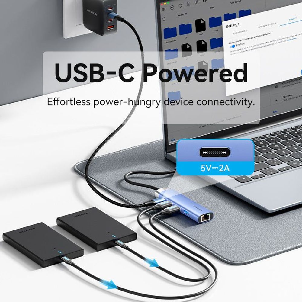 USB-C powered blue aluminum hub with multiple ports and connected cables