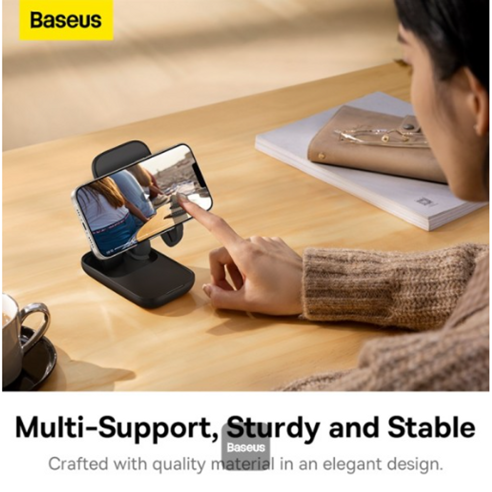 Black folding phone stand holding a phone in landscape orientation