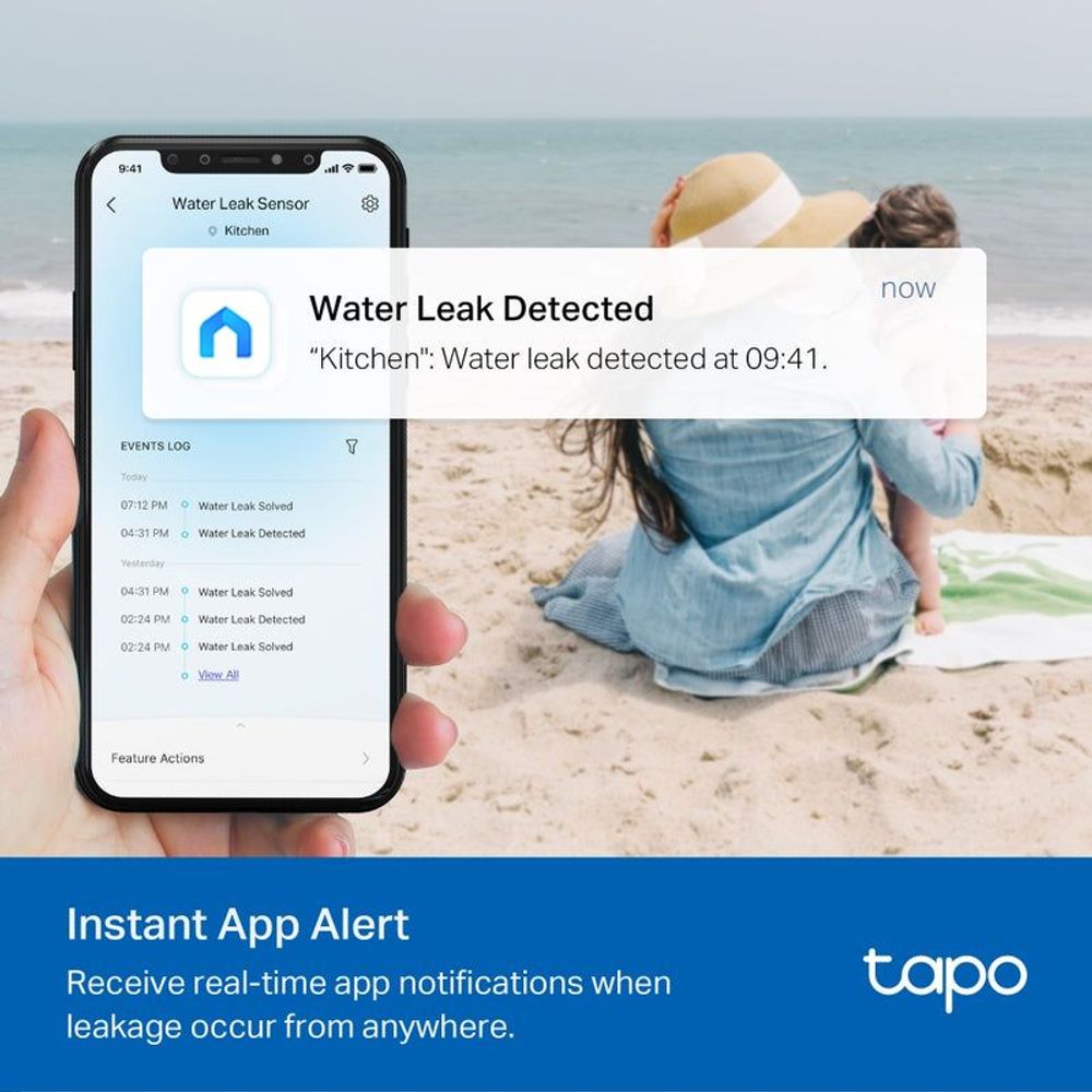 TP-Link Tapo smart water leak sensor next to smartphone notification alert