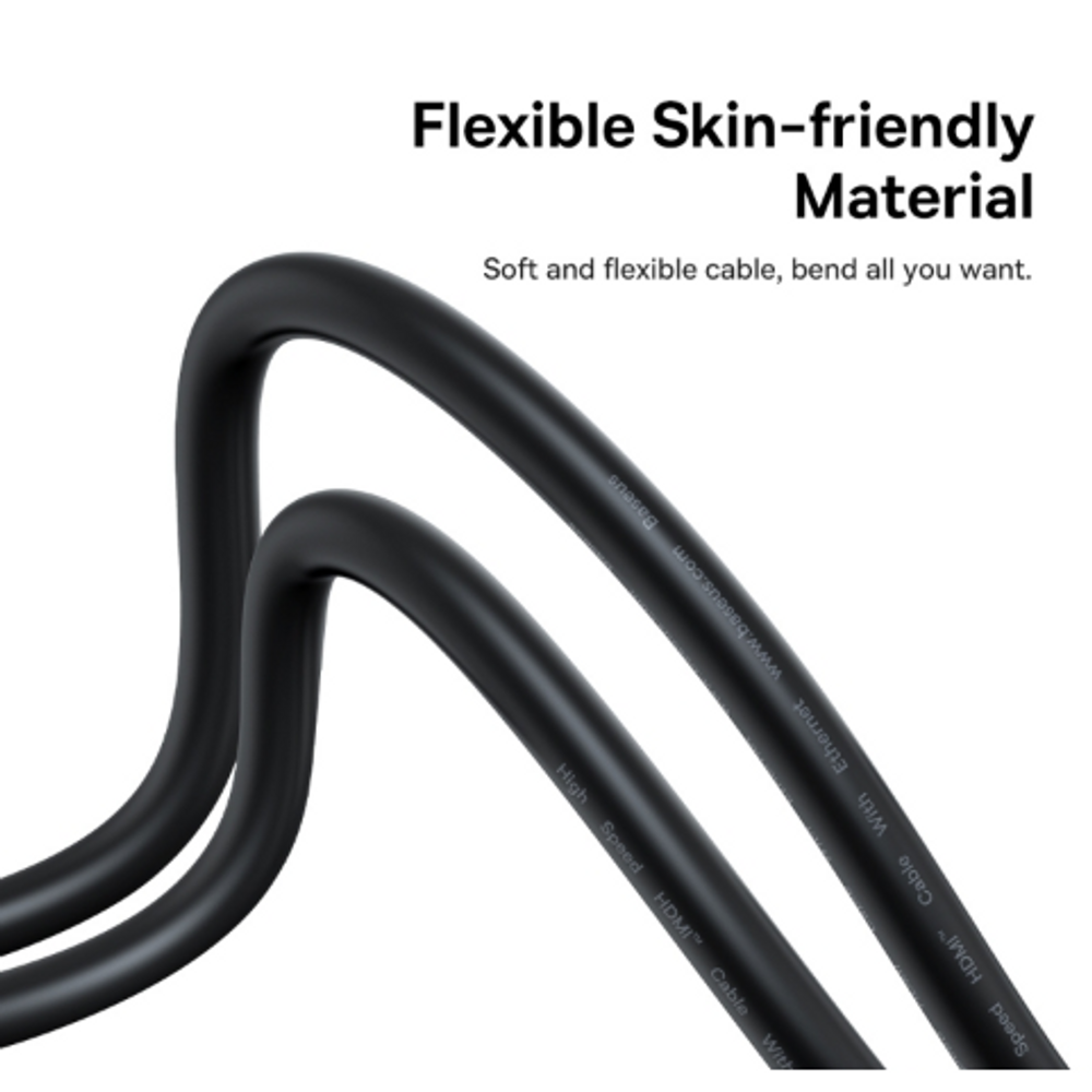 Flexible black HDMI cable, looped close-up with smooth, skin-friendly outer sheath