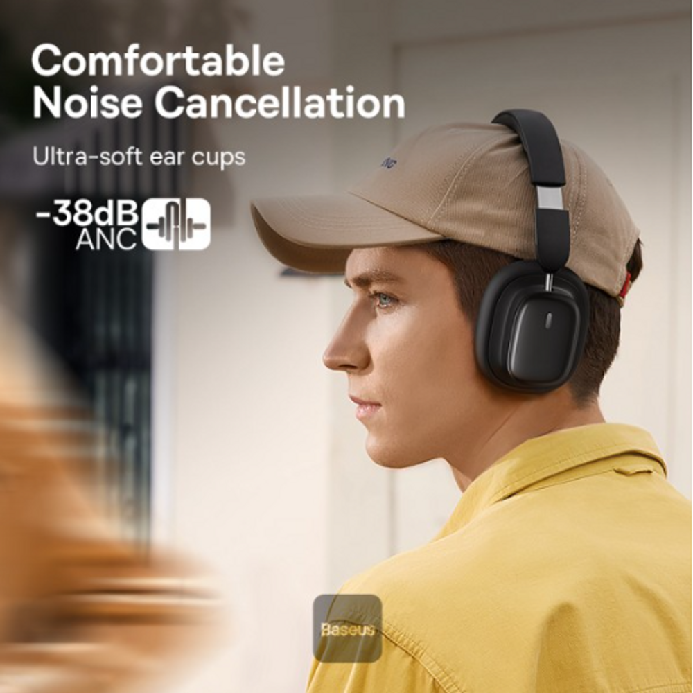 Black over-ear noise-cancelling headphones worn on a person with padded ear cups