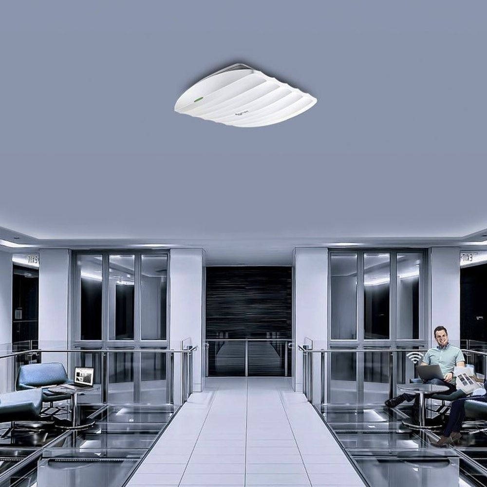 Ceiling-mounted TP-Link access point visible above hallway