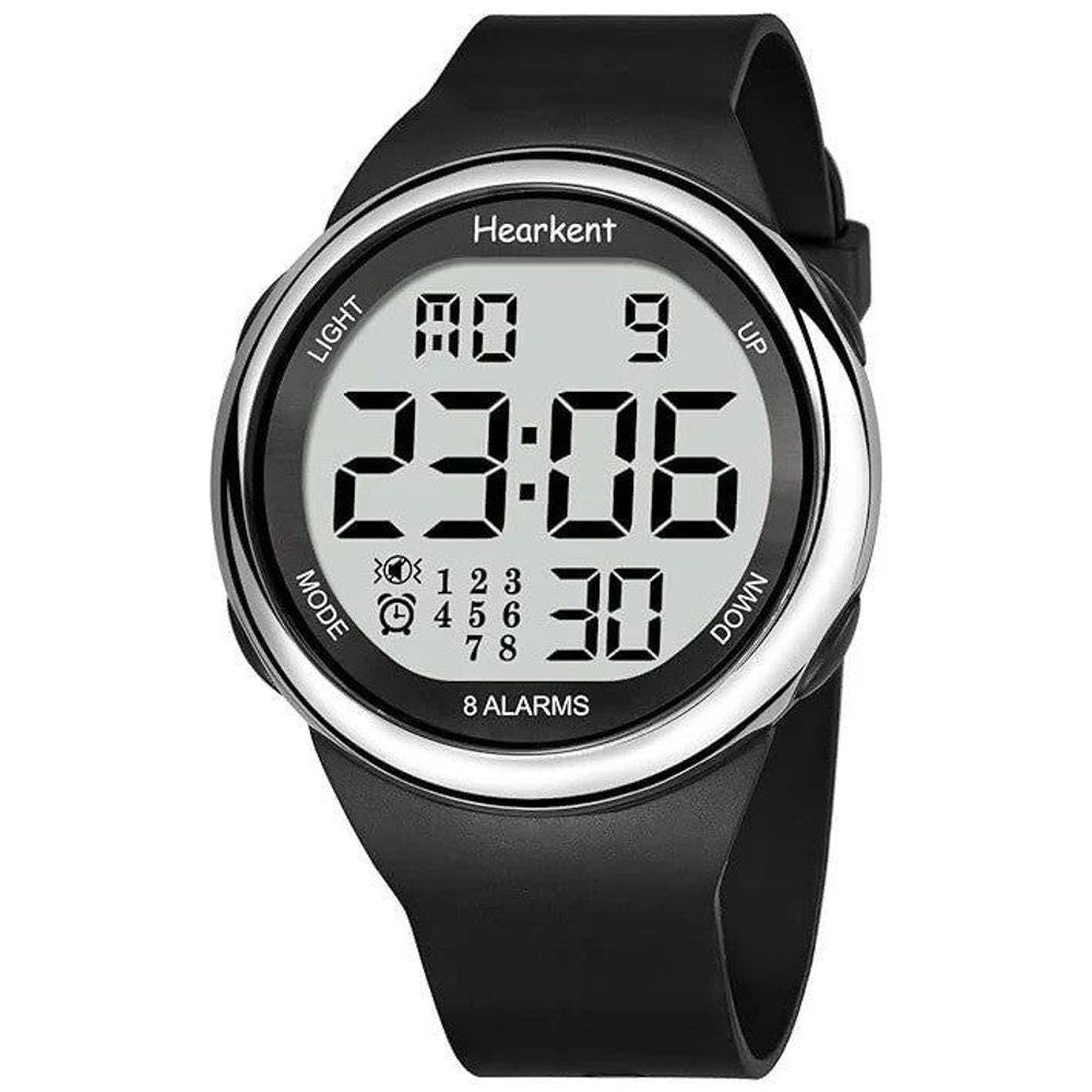 Black wrist watch with silver bezel; LCD displays 23:06 and alarm icons