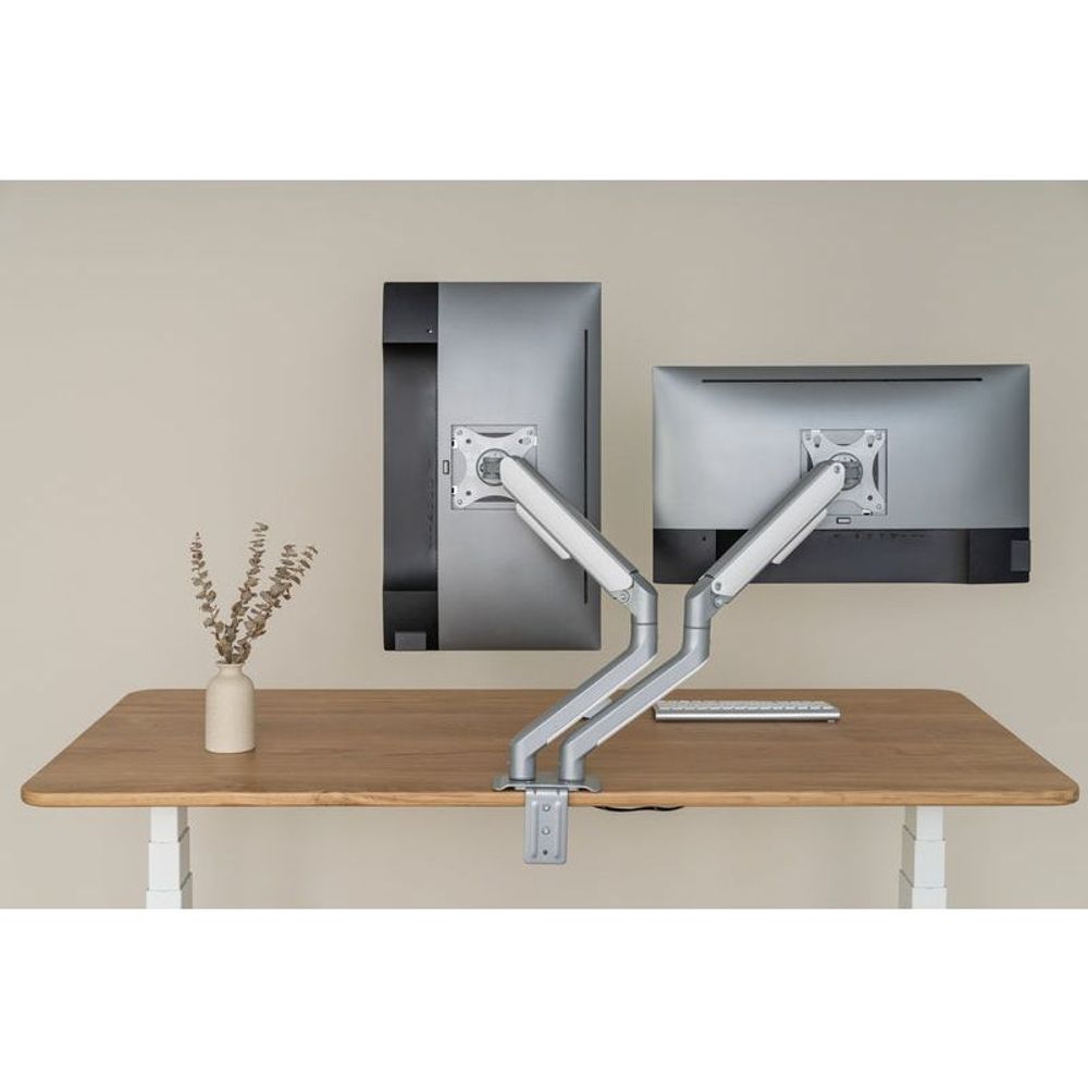 Dual monitor arm with two VESA mounts, supporting two monitors, silver-gray frame