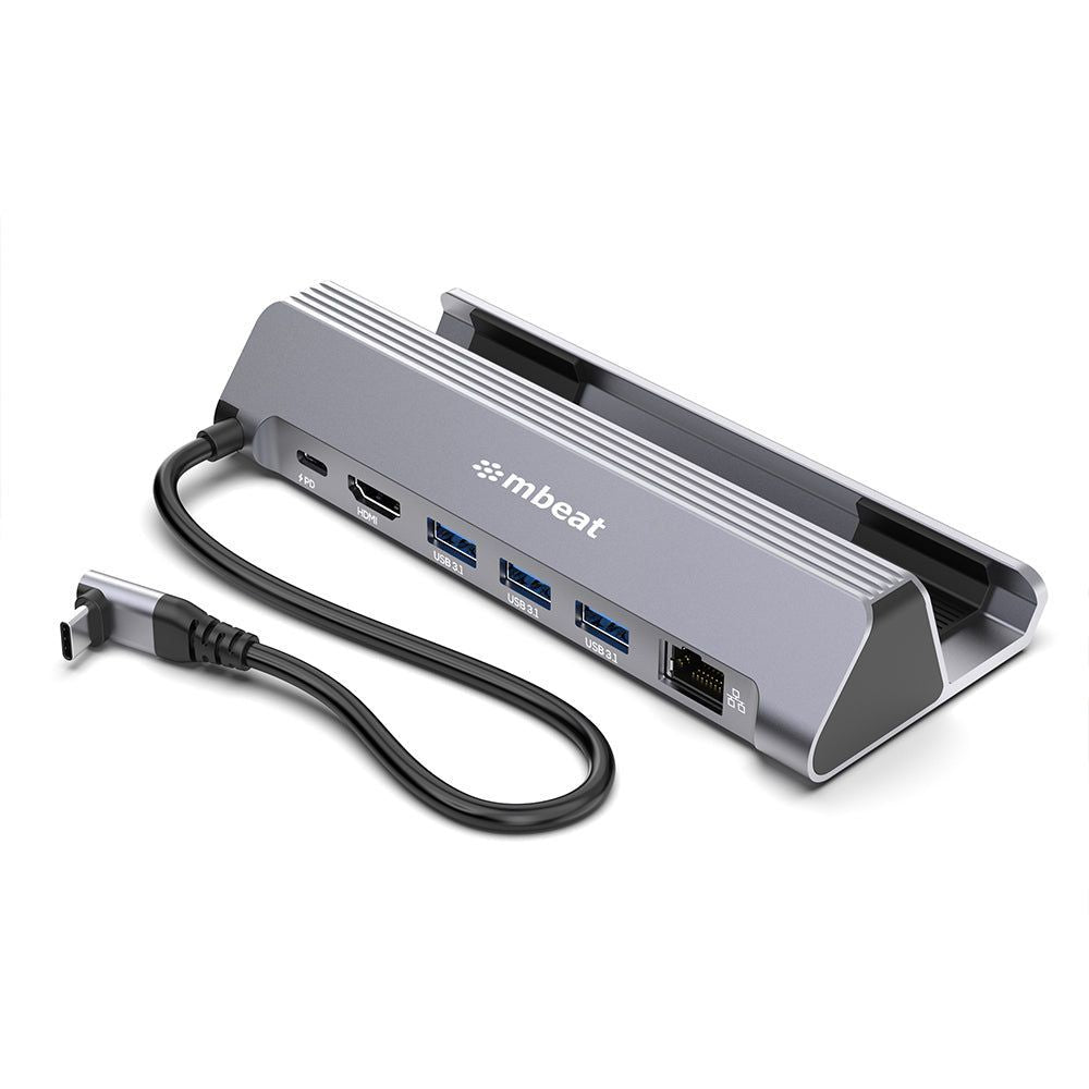 Gray USB-C gaming dock with multiple ports and connected cables