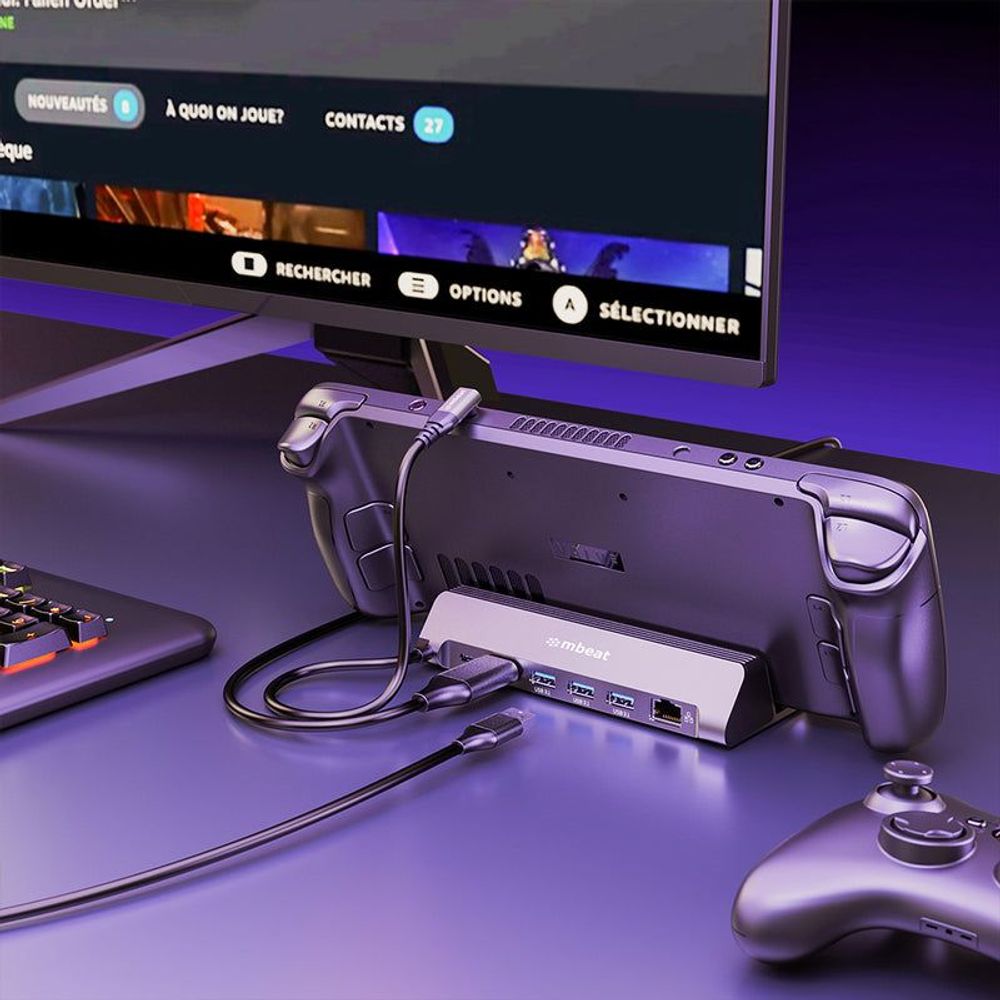 Gray USB-C gaming dock close-up with ports and attached cables