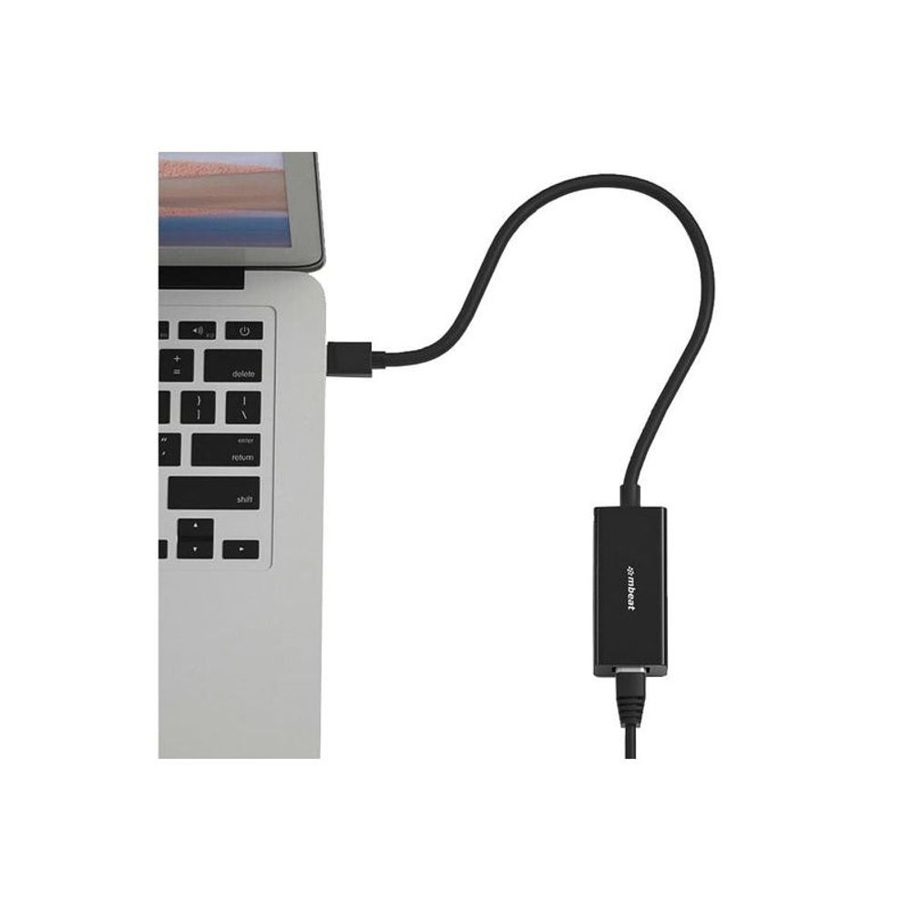 Black USB 3.0 to gigabit Ethernet adapter connected between laptop and RJ45