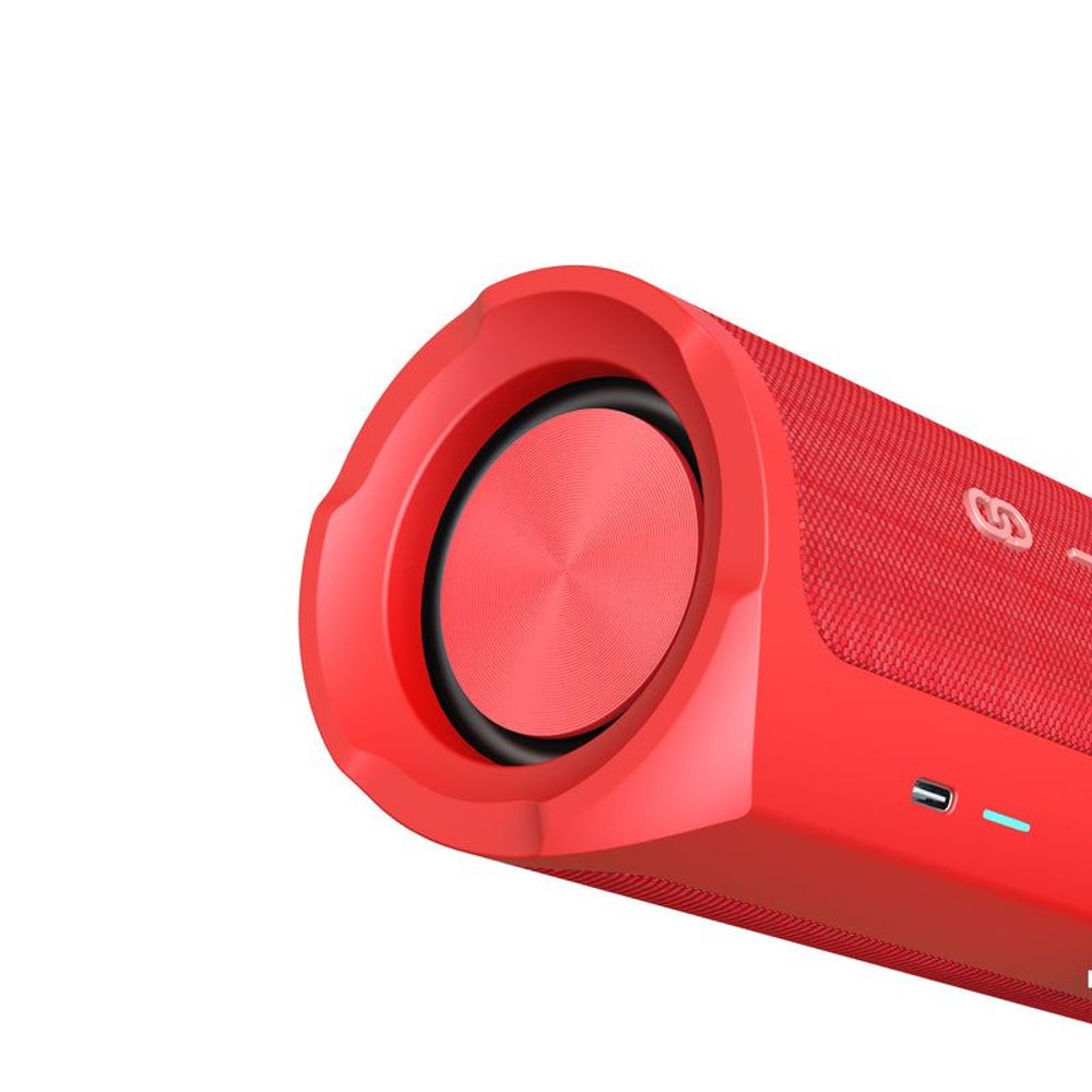 Close-up of red Bluetooth speaker end cap with large speaker grille and power controls