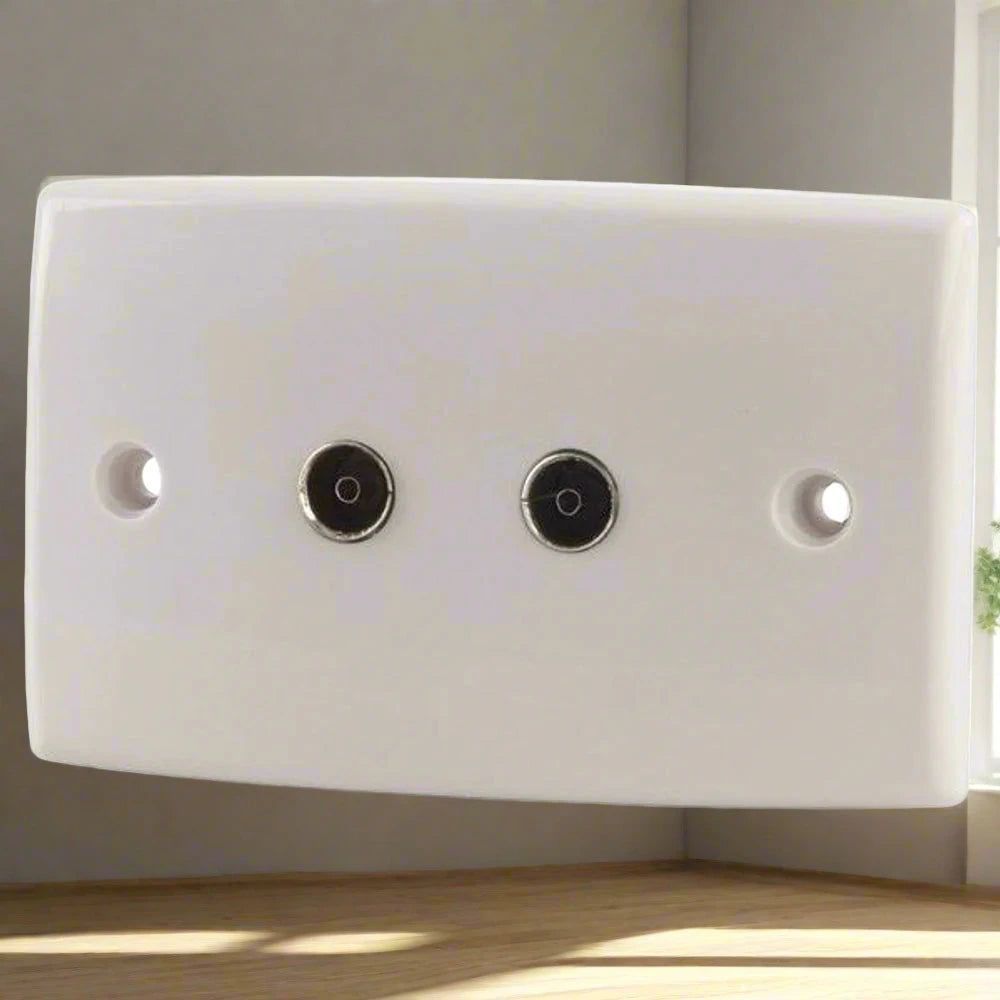Beige TV and FM wallplate with two round black connector ports