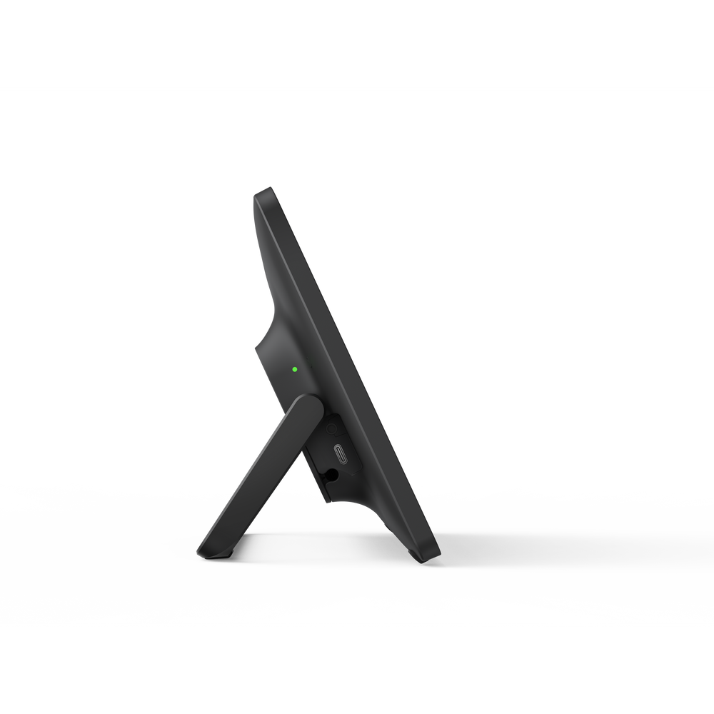 11.6-inch Yealink extended touch console angled side view, black stand, green light