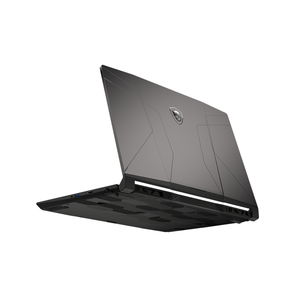 Gaming notebook open, dark gray keyboard deck with shield logo, showing ports area.