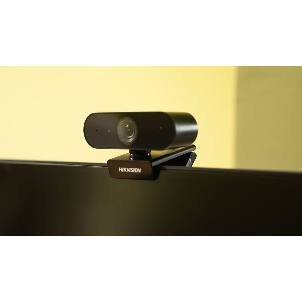 HIKVISION webcam with wide lens on top of hinged base, black casing