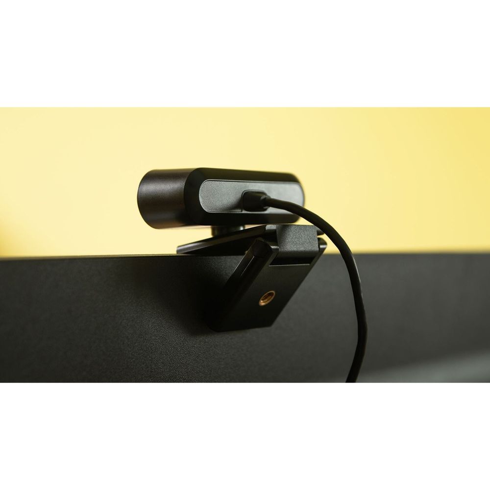 Black desktop webcam with hinged mount and connected cable, HIKVISION logo front