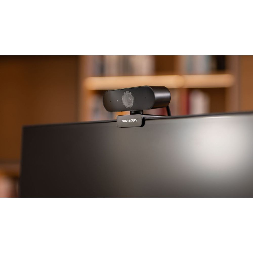 HIKVISION webcam centered on screen top, black body with lens and mic