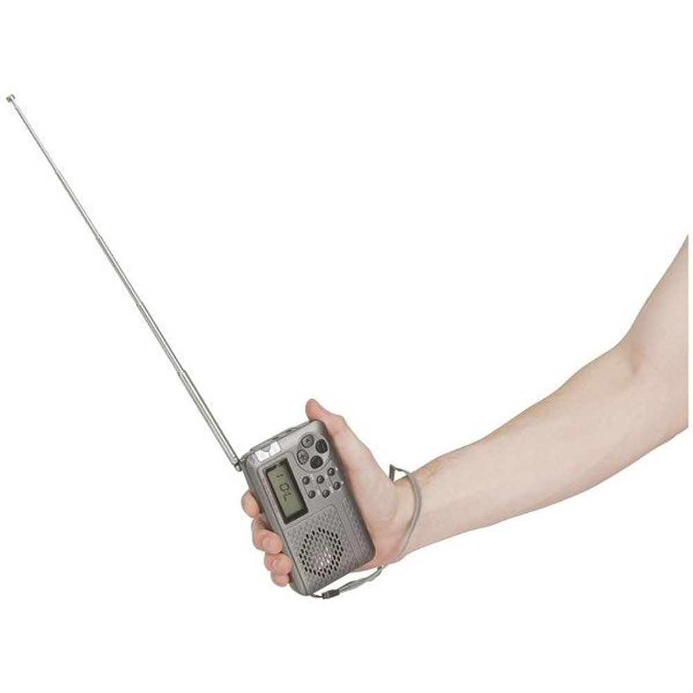 Pocket radio held in hand with extended antenna and LCD screen